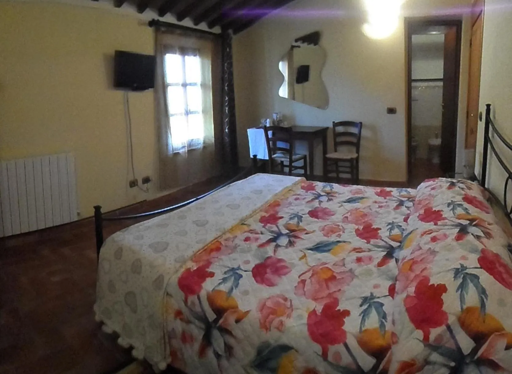 Photo of the whole room, Bed in Il Pozzo Di Sant'Andrea