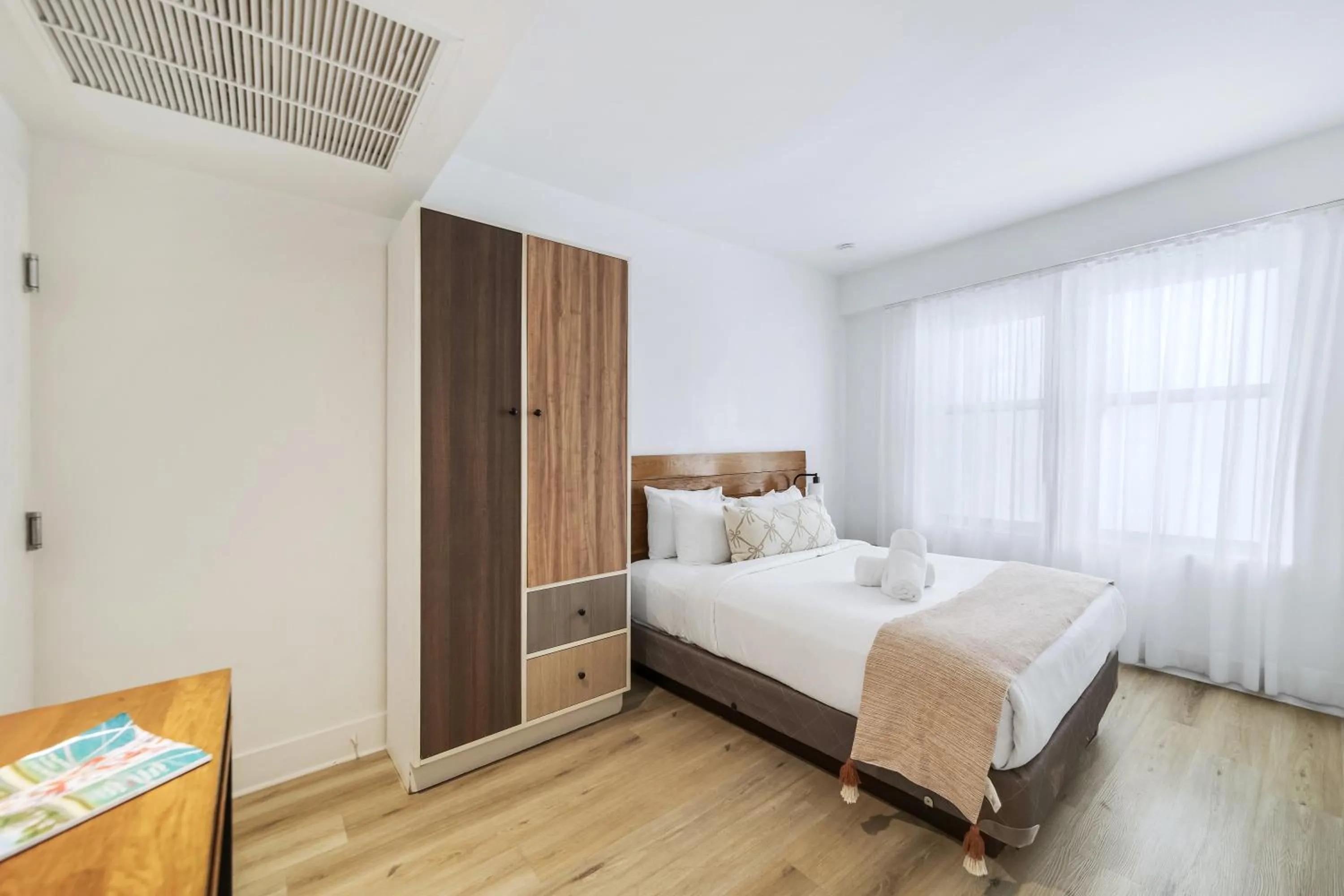 Bed in The Meridian Hotel by At Mine Hospitality