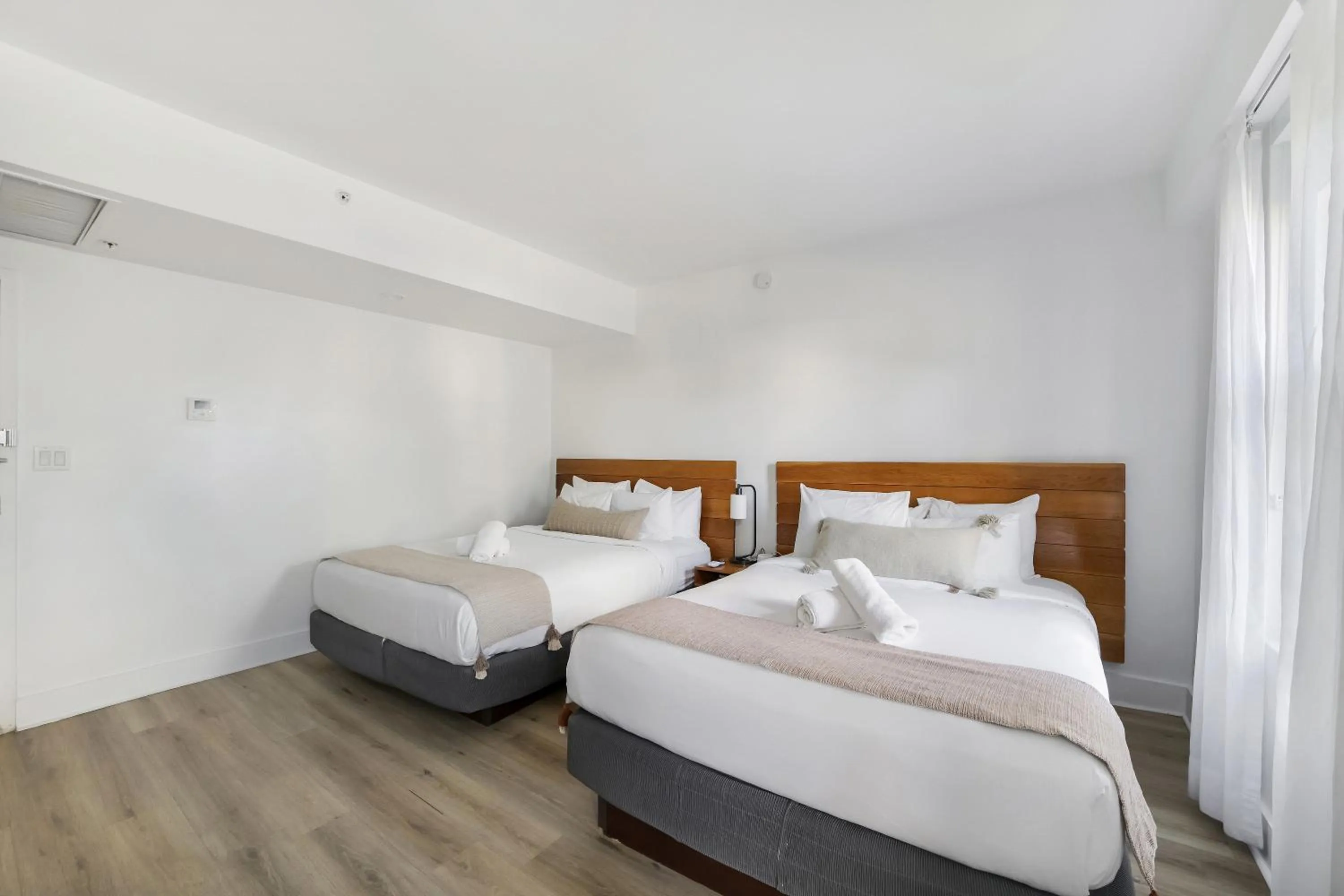 Bed in The Meridian Hotel by At Mine Hospitality