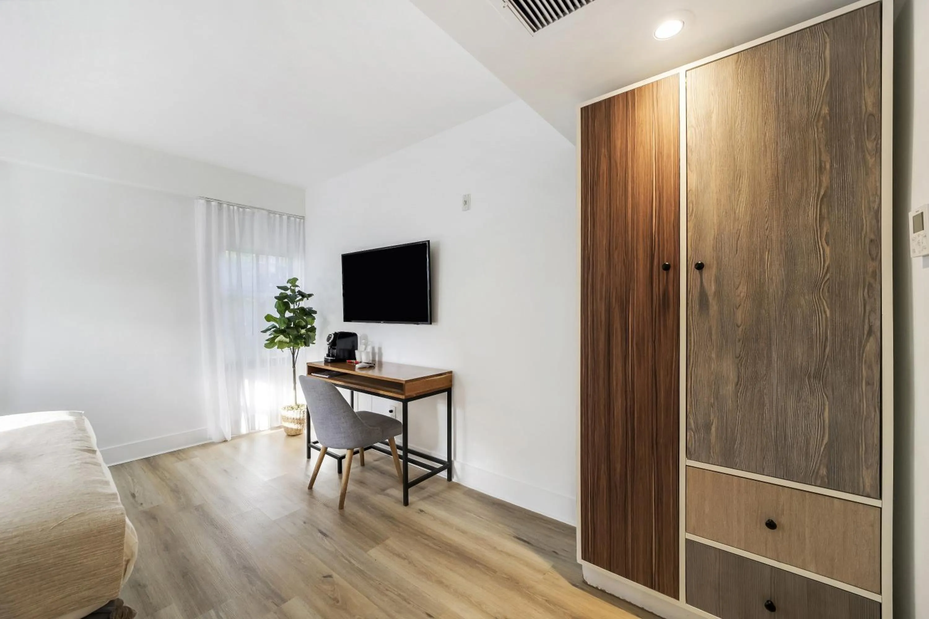 Bed in The Meridian Hotel by At Mine Hospitality