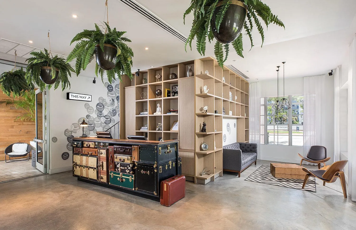 Communal lounge/ TV room in The Meridian Hotel by At Mine Hospitality