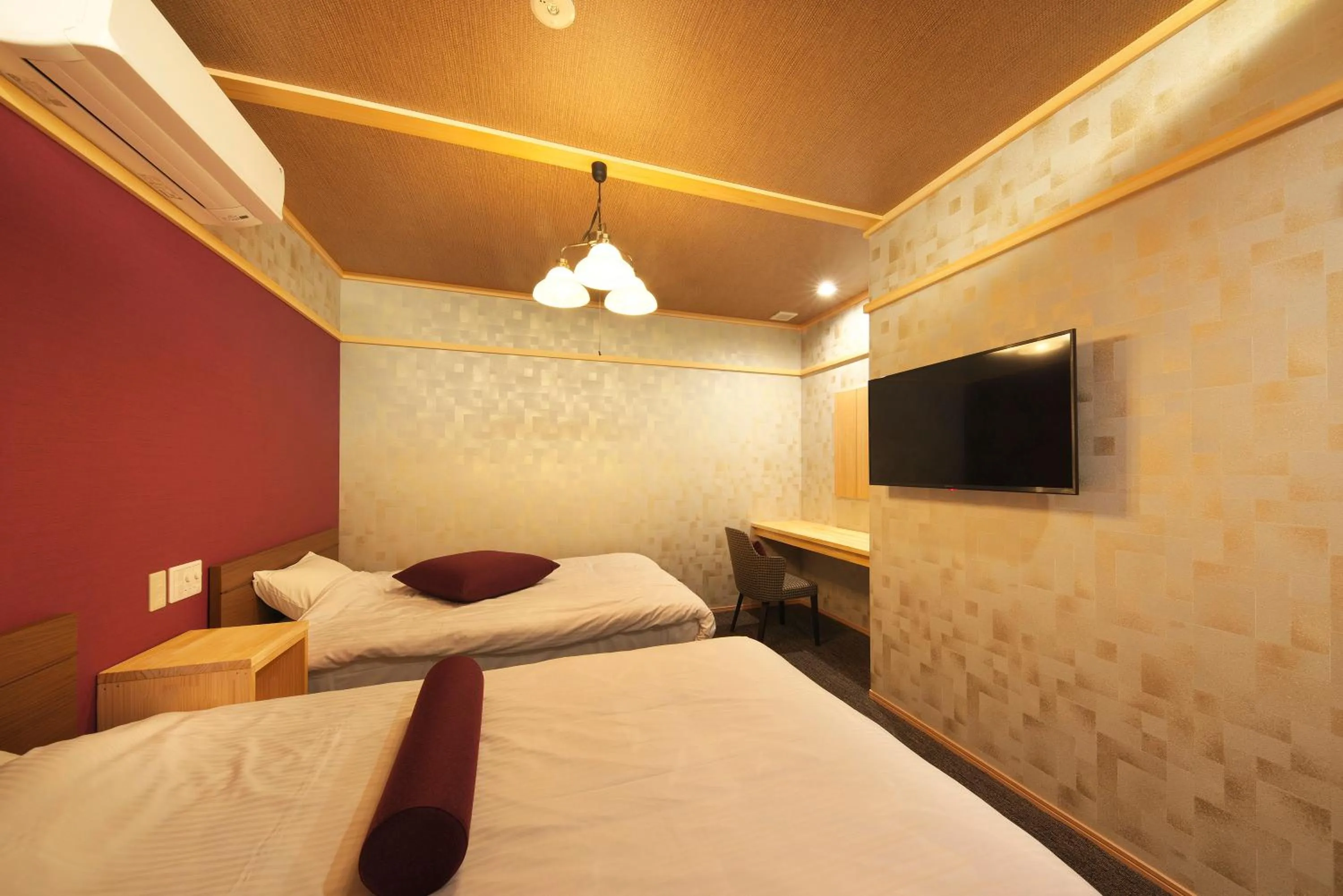 Bed in Meitei no Yado Hotel Koshien