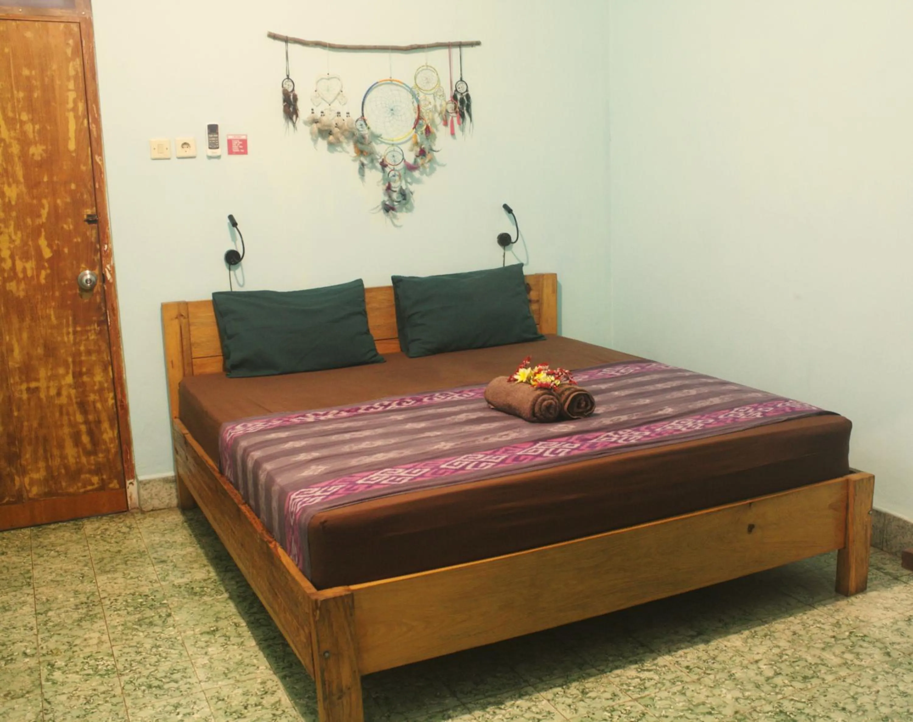 Photo of the whole room, Bed in Good Karma Yogyakarta