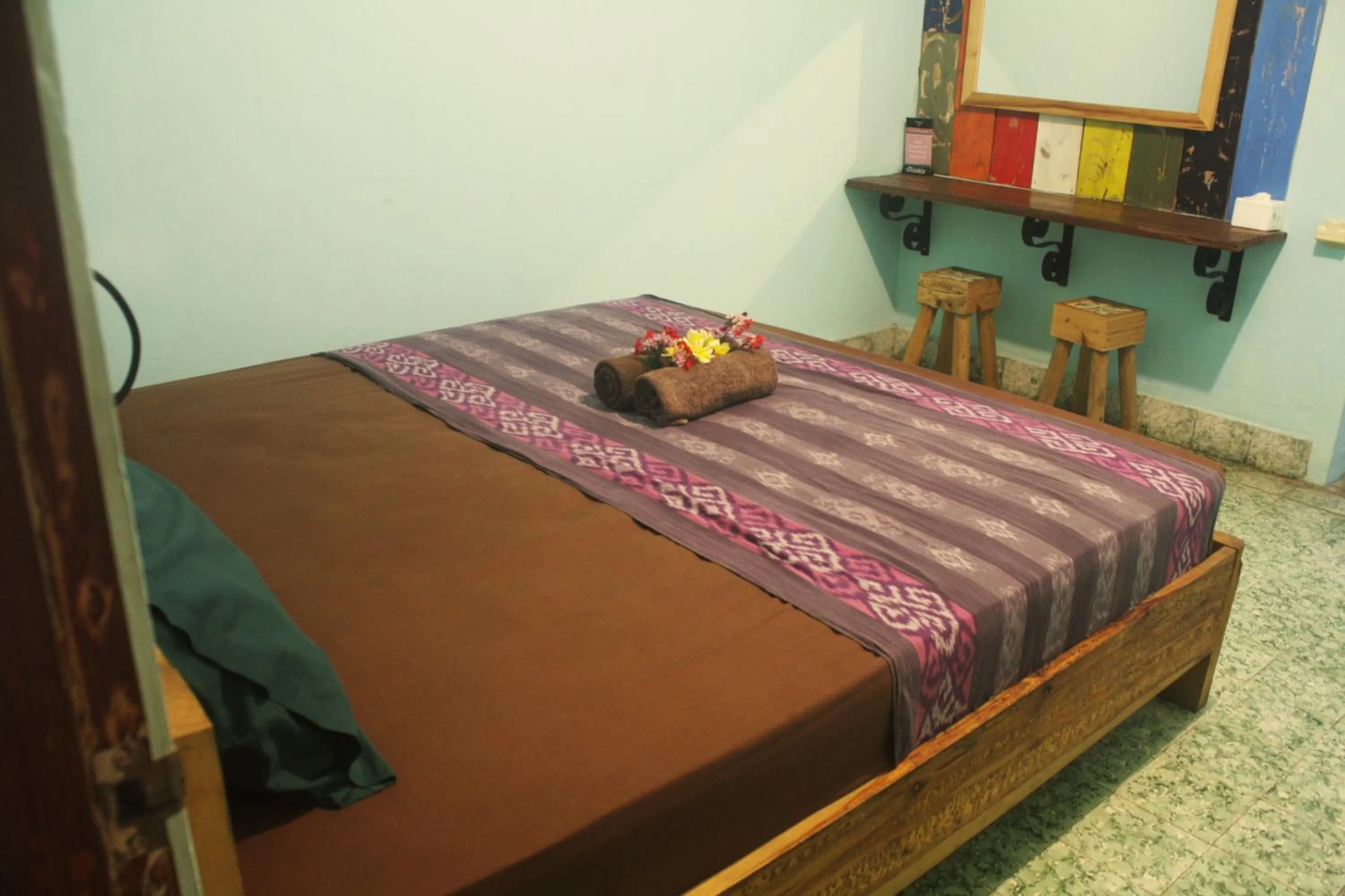 Photo of the whole room, Bed in Good Karma Yogyakarta