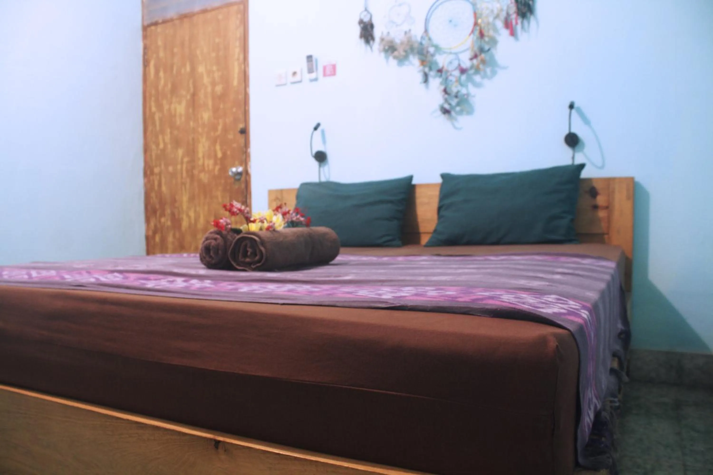 Photo of the whole room, Bed in Good Karma Yogyakarta