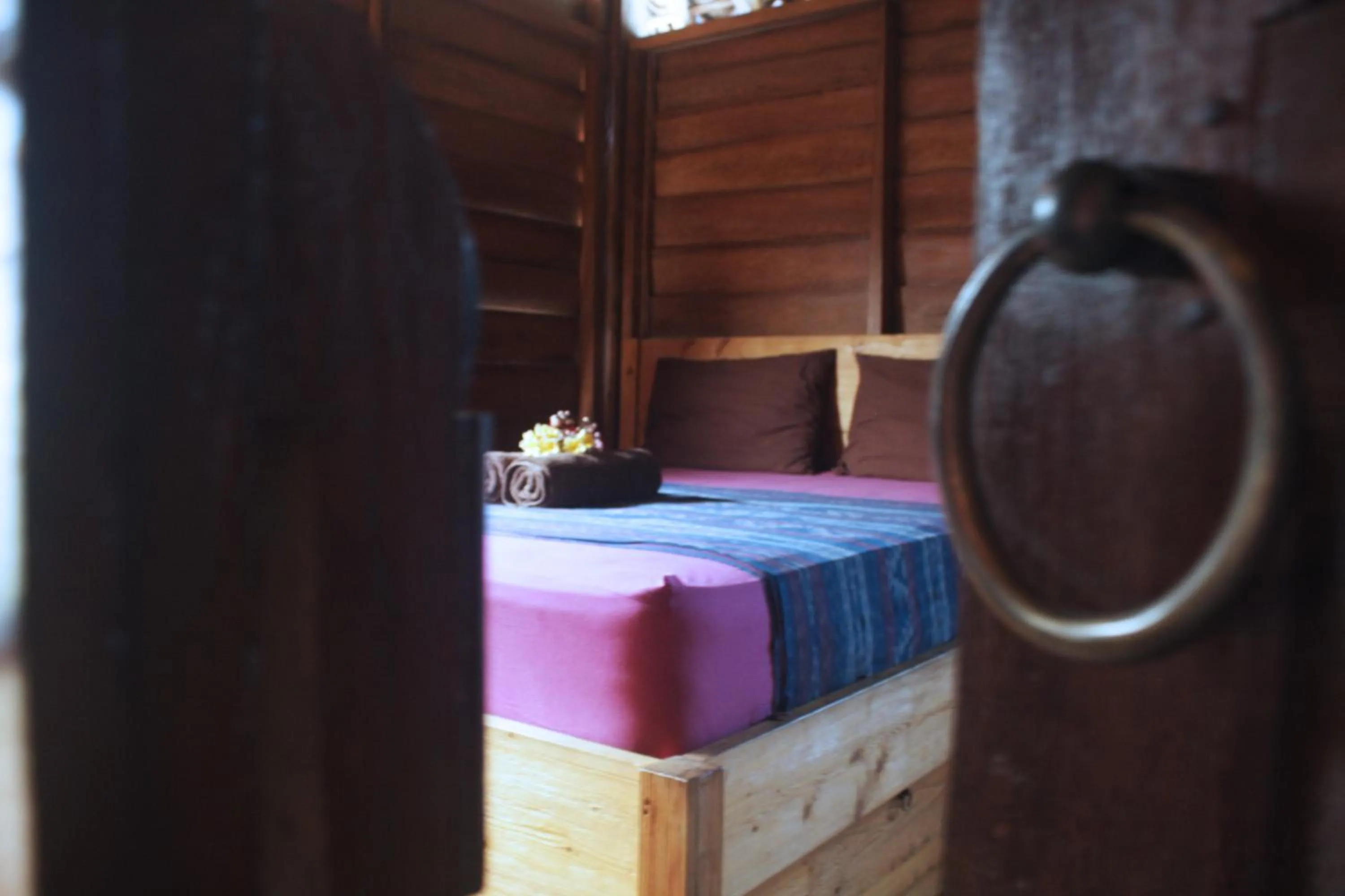 Photo of the whole room, Bed in Good Karma Yogyakarta