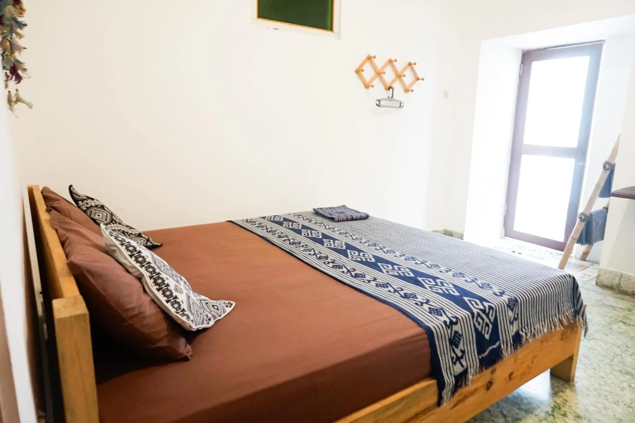 Bed in Good Karma Yogyakarta