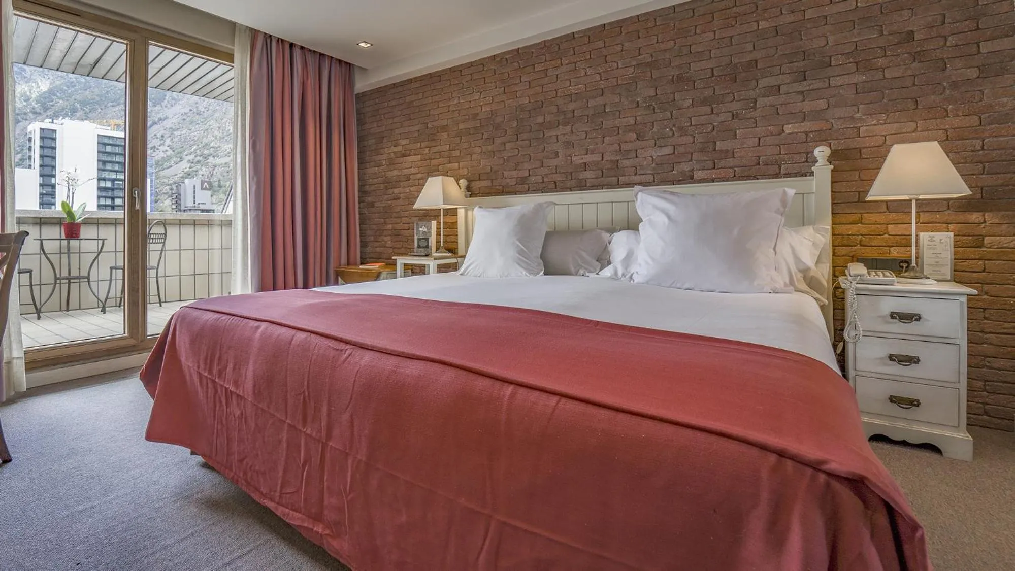 Photo of the whole room, Bed in Roc Blanc Hotel & Spa