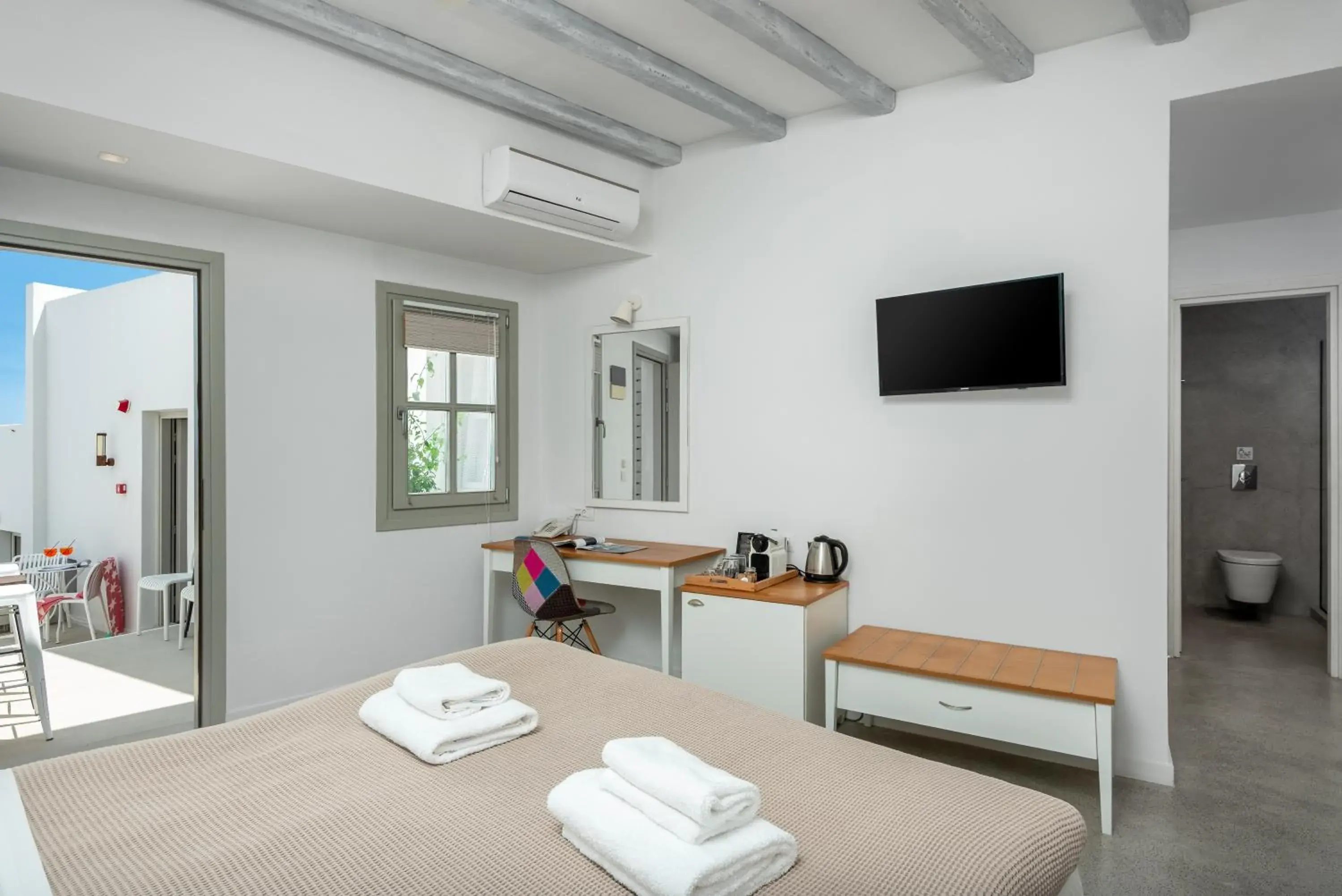 Coffee/tea facilities, Bed in Lindos Comfy Suites Coffee/tea facilities, Bed in Lindos Comfy Suites