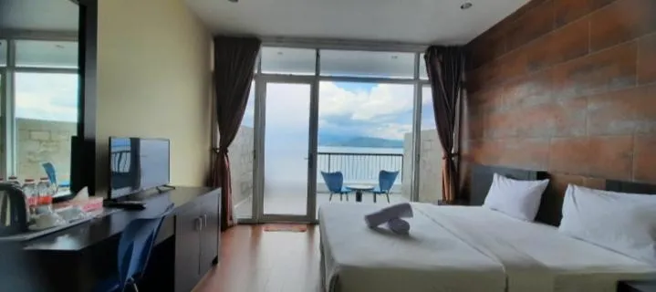 Bed in Tiara Bunga Hotel & Villa