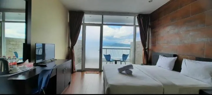 Bed in Tiara Bunga Hotel & Villa