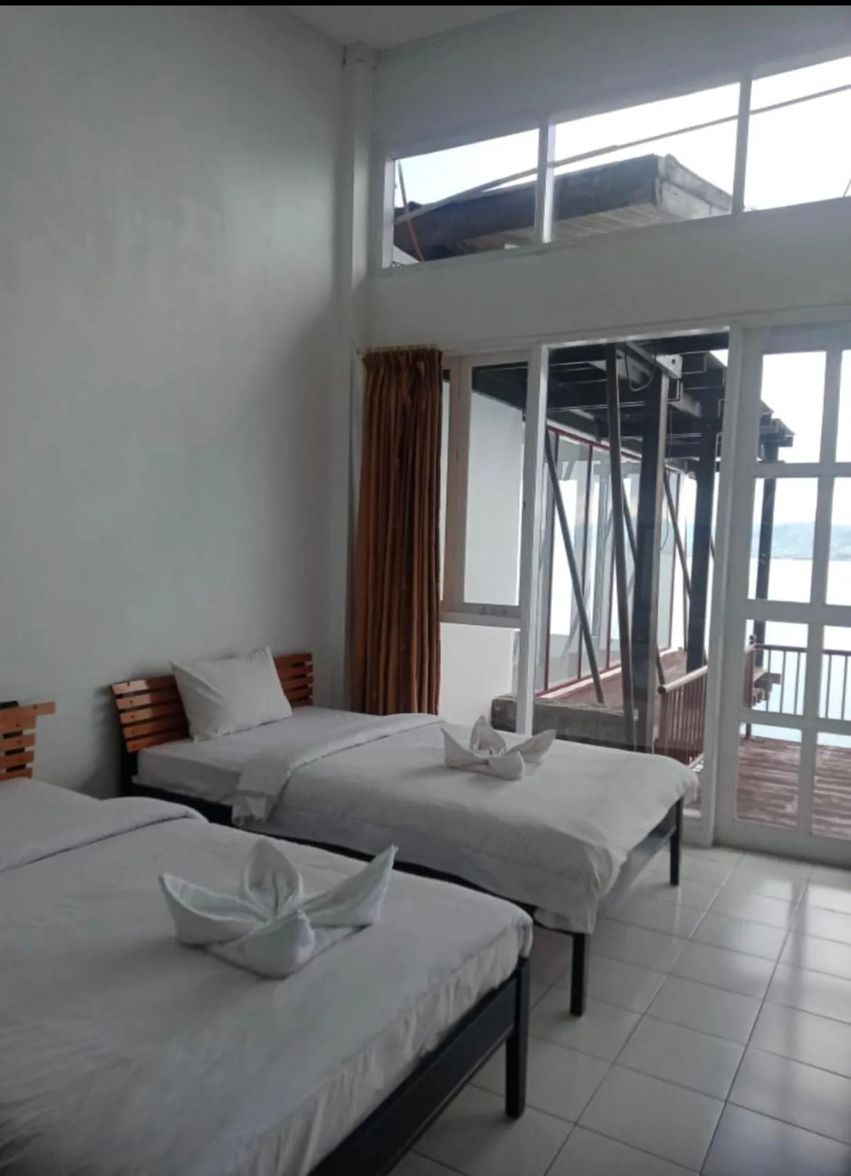 Bed in Tiara Bunga Hotel & Villa