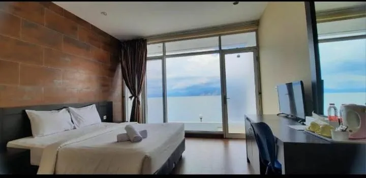 Bed in Tiara Bunga Hotel & Villa