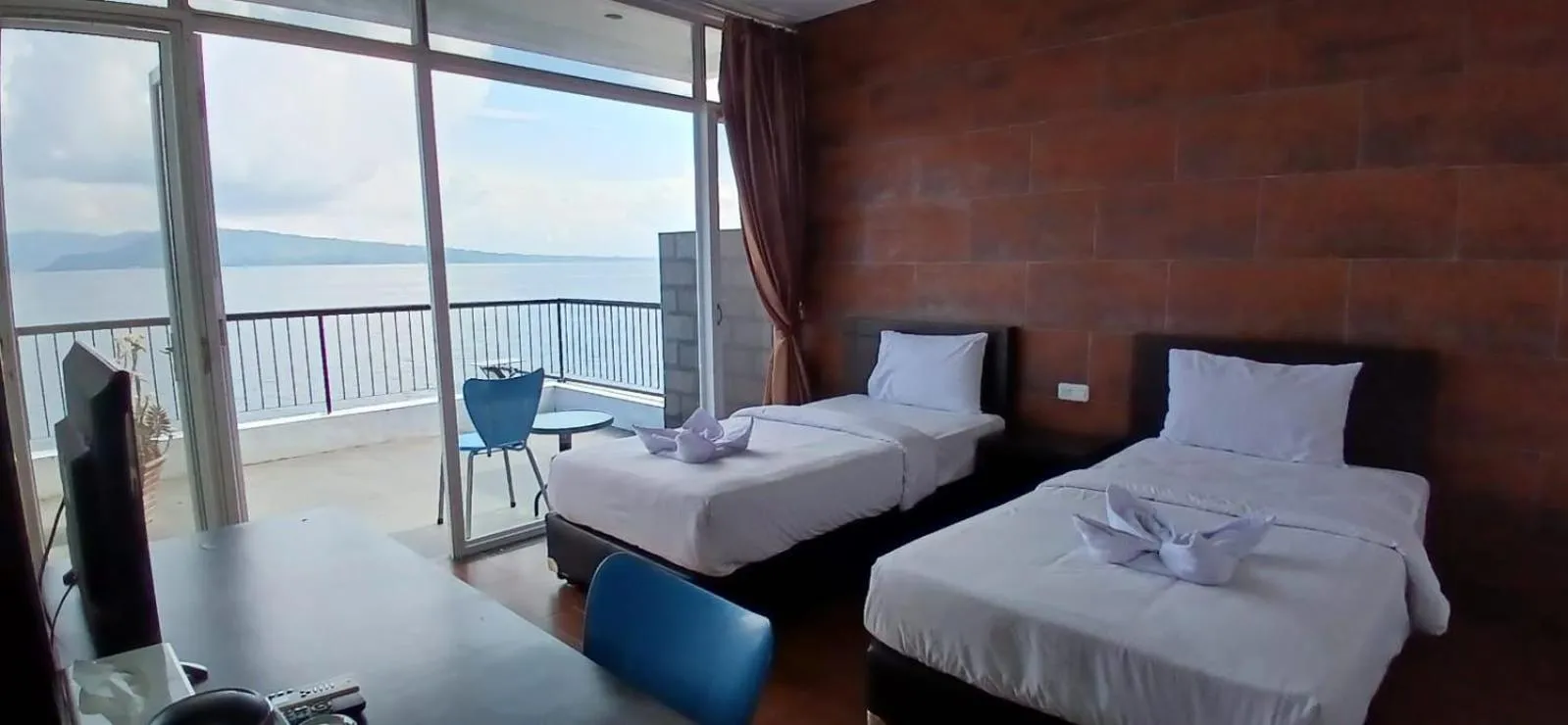 Bed in Tiara Bunga Hotel & Villa