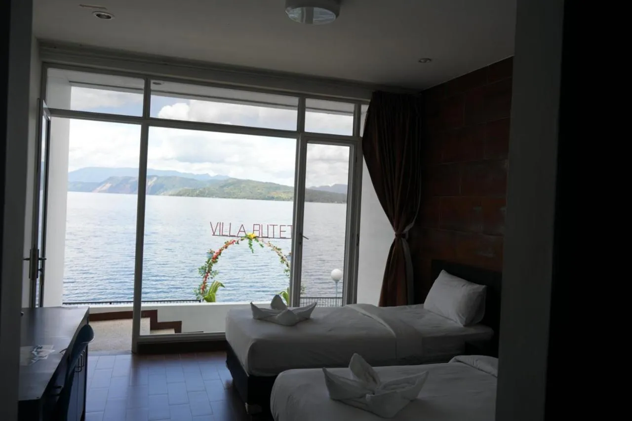 Bed in Tiara Bunga Hotel & Villa
