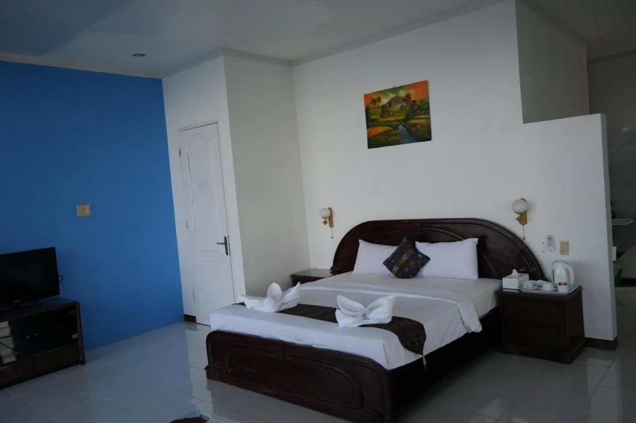 Bed in Tiara Bunga Hotel & Villa