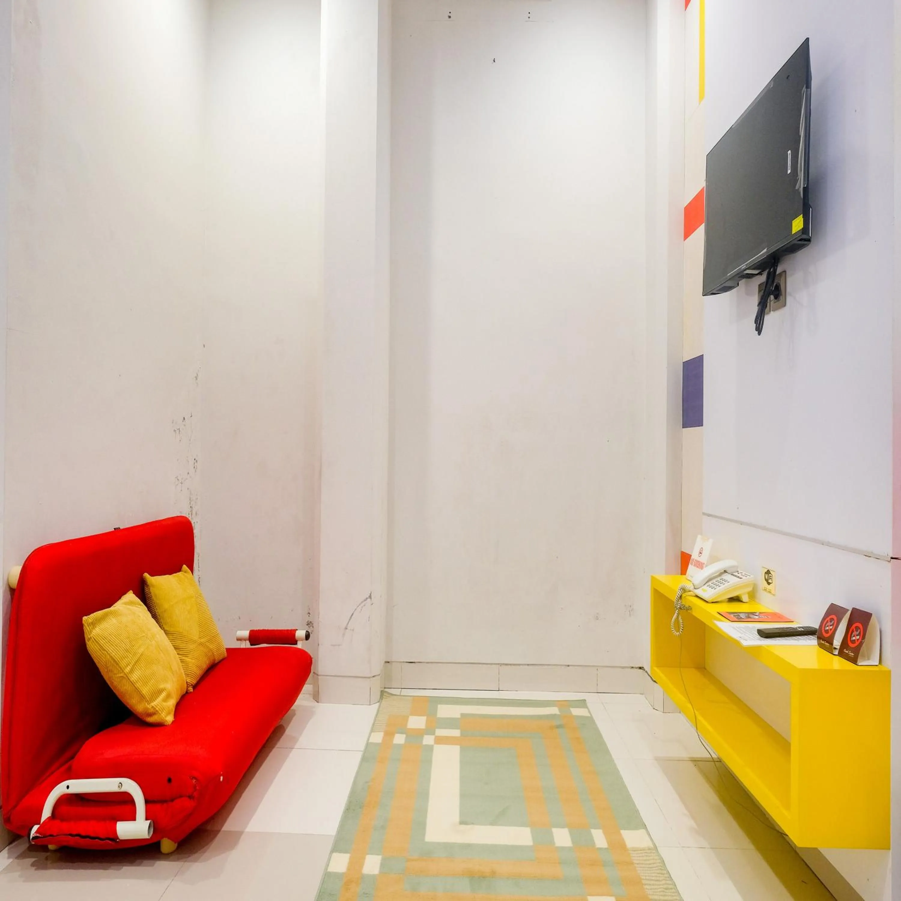 Bedroom in Sans Vibes Hotel Grand Omah Sastro Gejayan