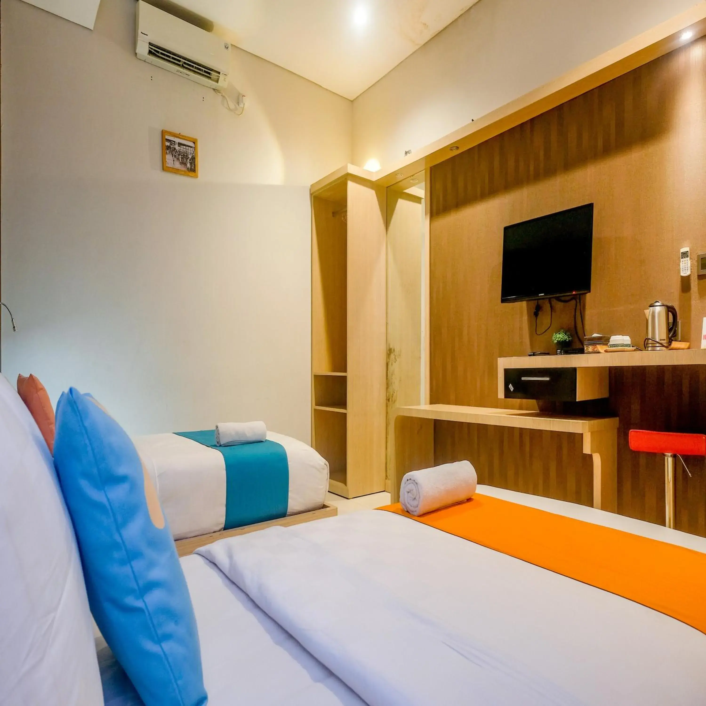 Bedroom, Bed in Sans Vibes Hotel Grand Omah Sastro Gejayan Bedroom, Bed in Sans Vibes Hotel Grand Omah Sastro Gejayan