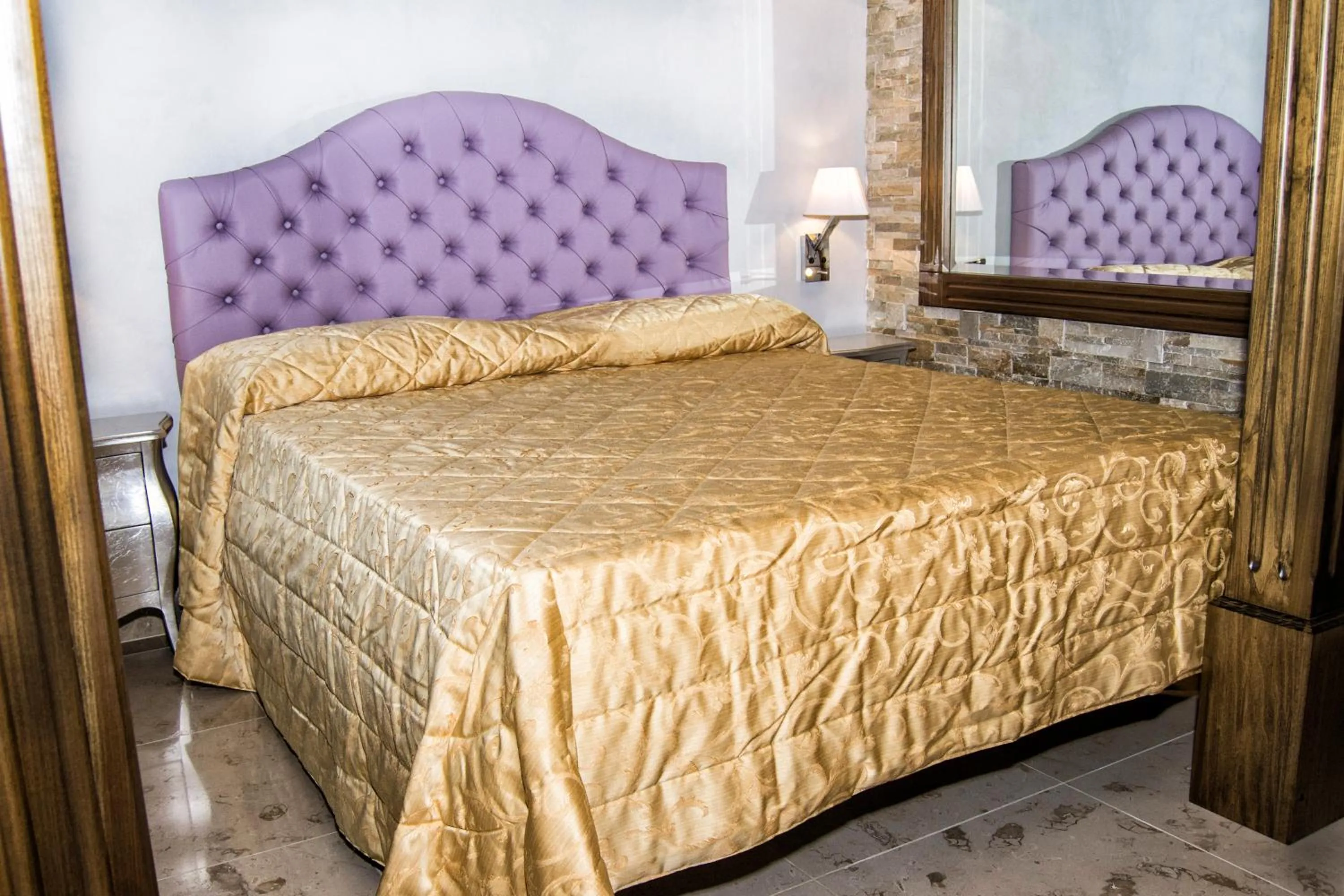 Decorative detail, Bed in B&B Casa Dilillo
