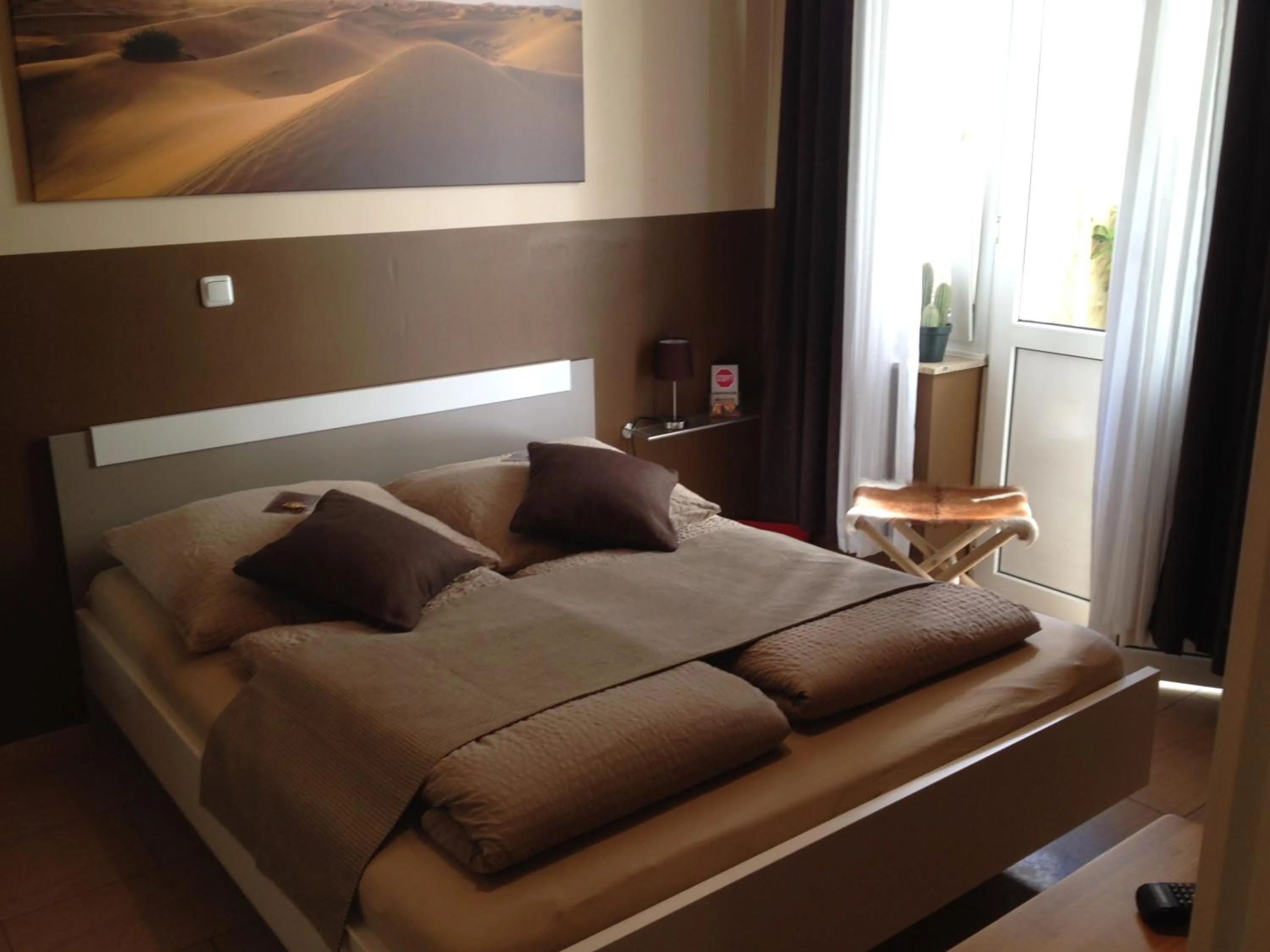 Photo of the whole room, Bed in Hotel Sandmanns am Dom