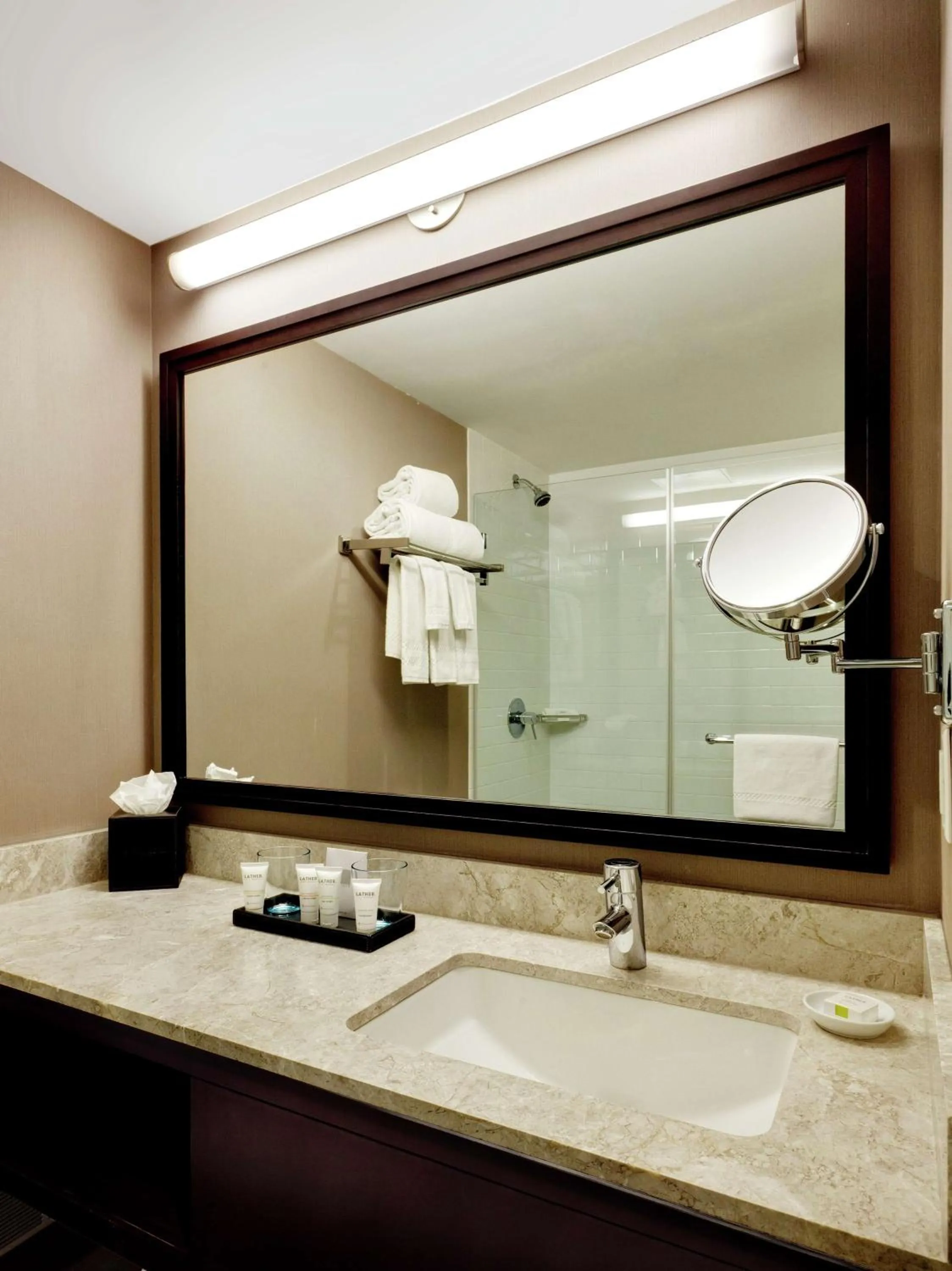 Bathroom in Distrikt Hotel New York City, Tapestry Collection by Hilton