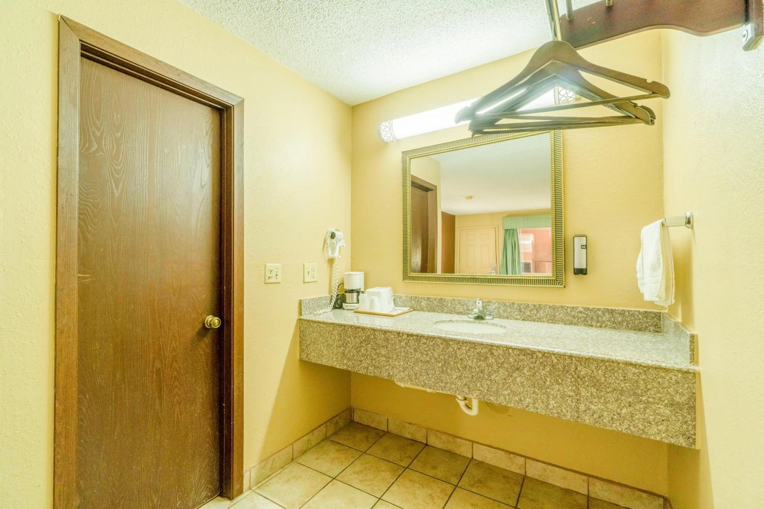 Bathroom in Crown Inn By OYO Denver Tx