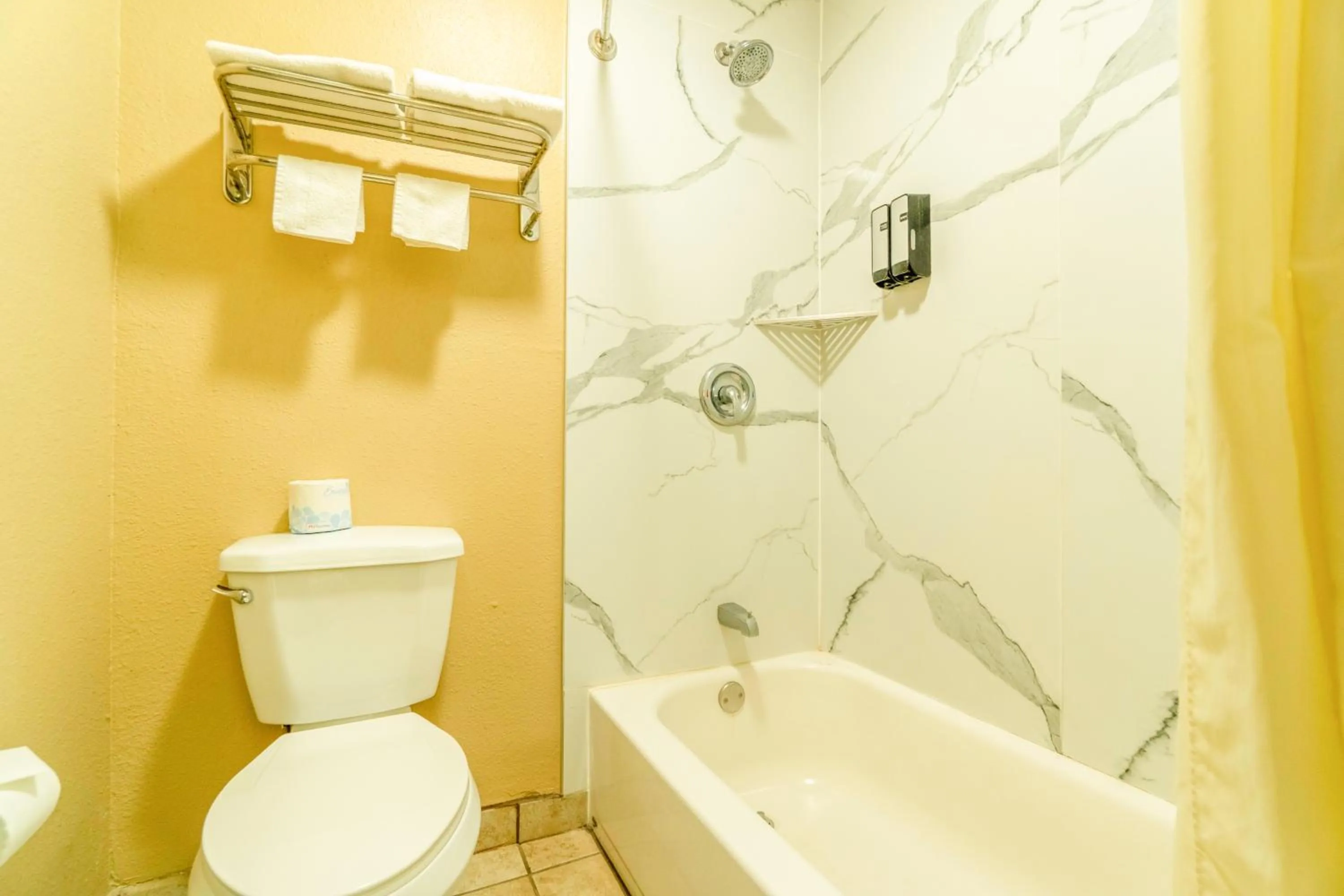 Bathroom in Crown Inn By OYO Denver Tx