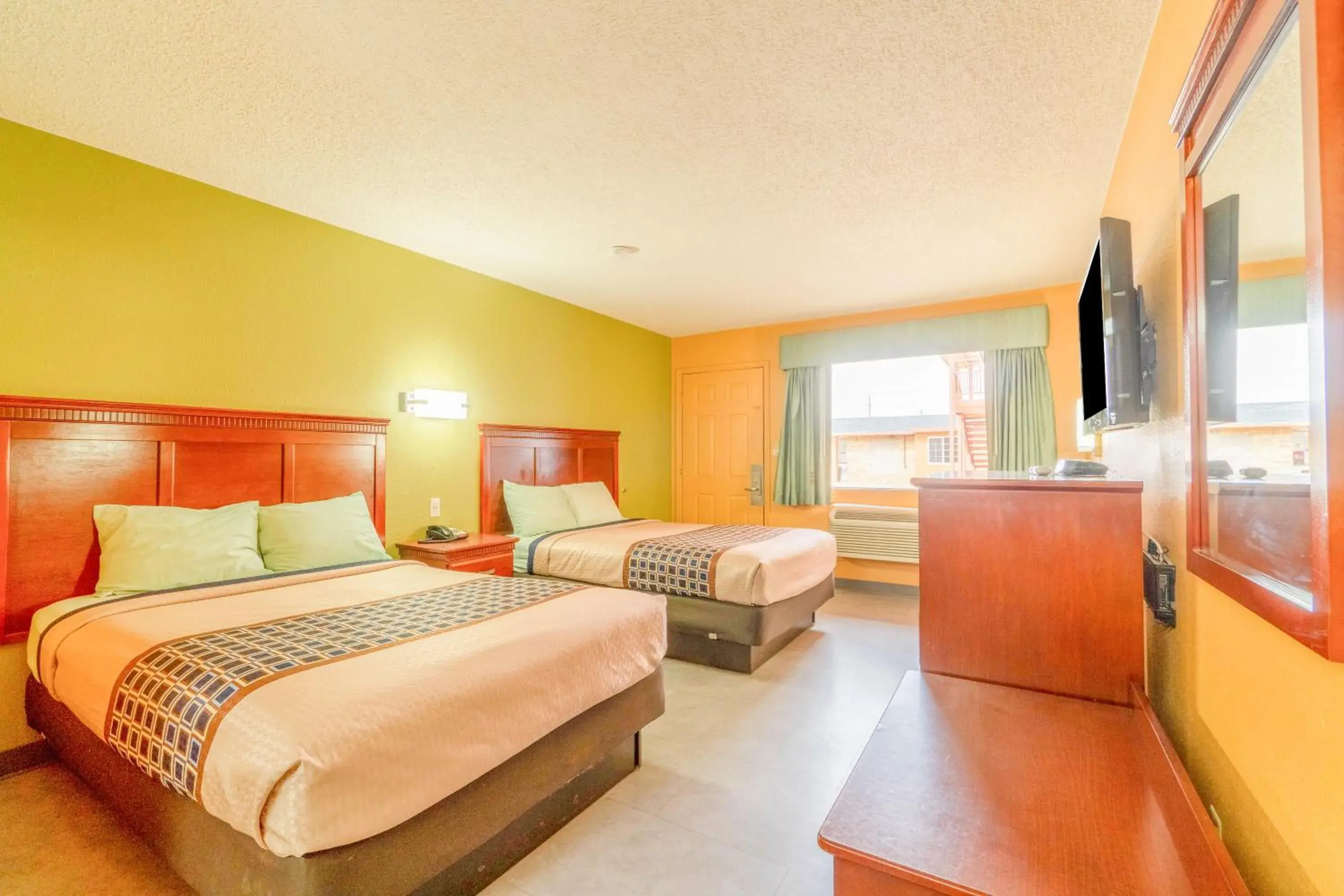 Bedroom, Bed in Crown Inn By OYO Denver Tx Bedroom, Bed in Crown Inn By OYO Denver Tx