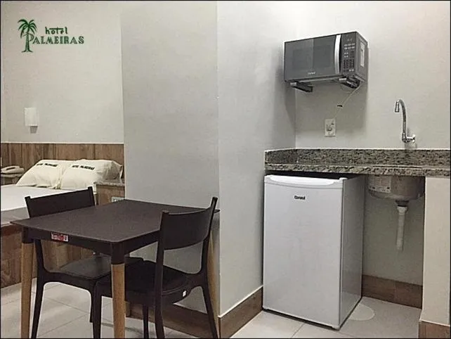 Dining area in Hotel Palmeiras Ltda