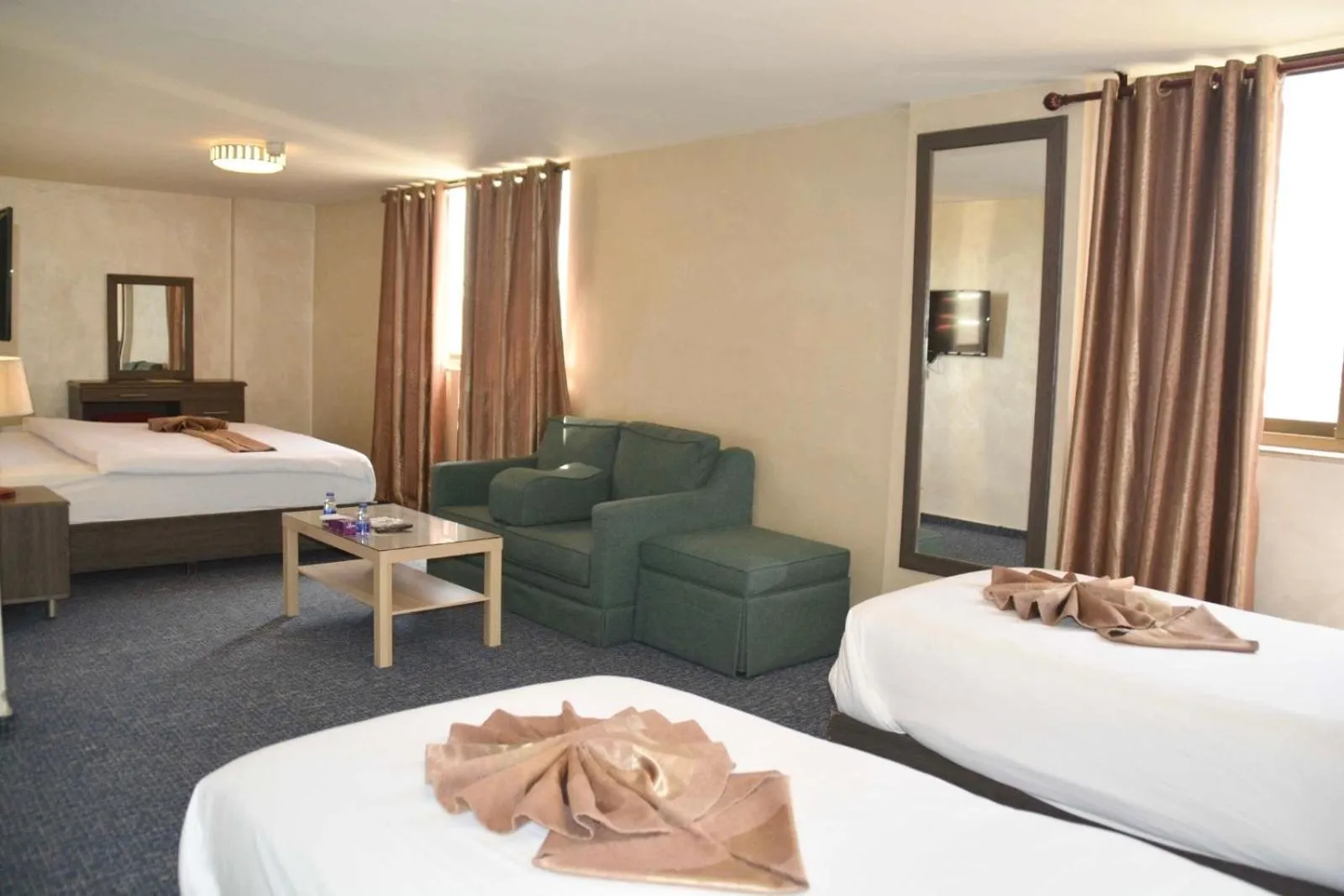 Bed in Olive Hotel Amman