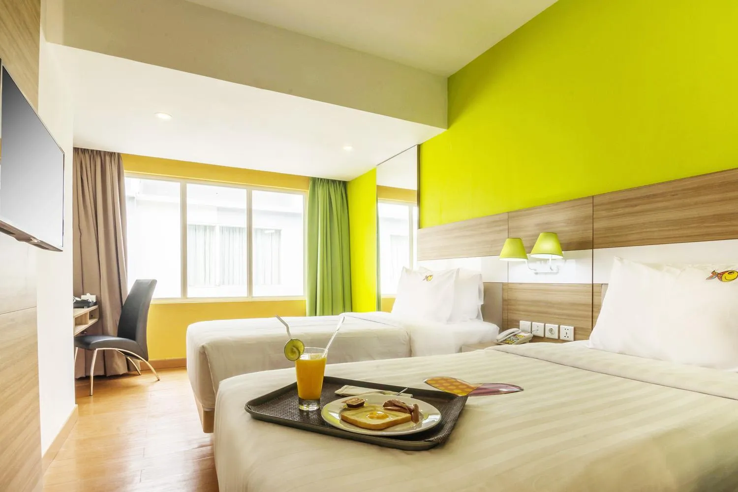 Bed in MaxOneHotels at Resort Makassar