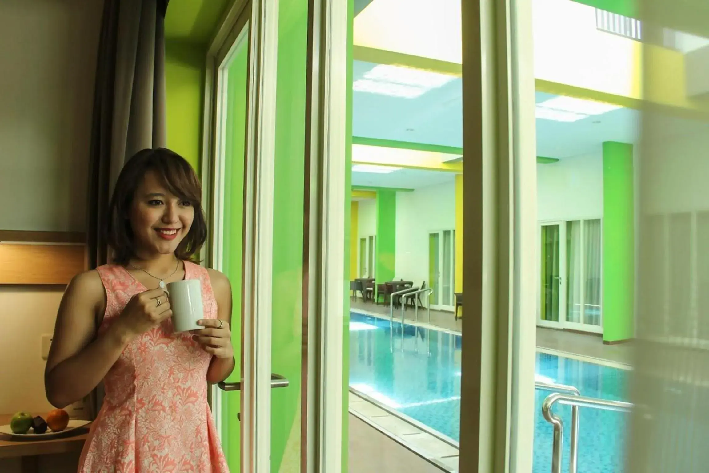 Pool view in MaxOneHotels at Resort Makassar Pool view in MaxOneHotels at Resort Makassar