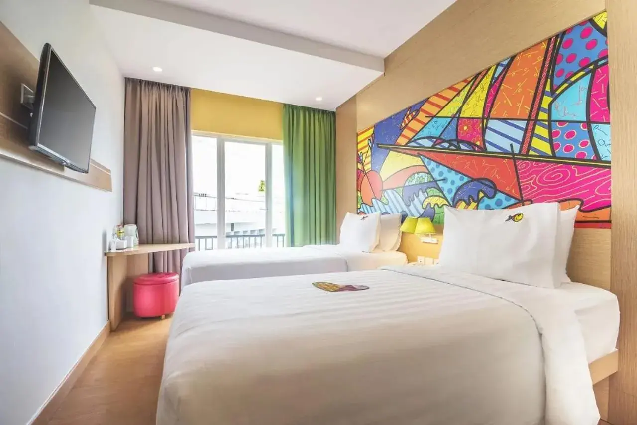 Bed in MaxOneHotels at Resort Makassar Bed in MaxOneHotels at Resort Makassar