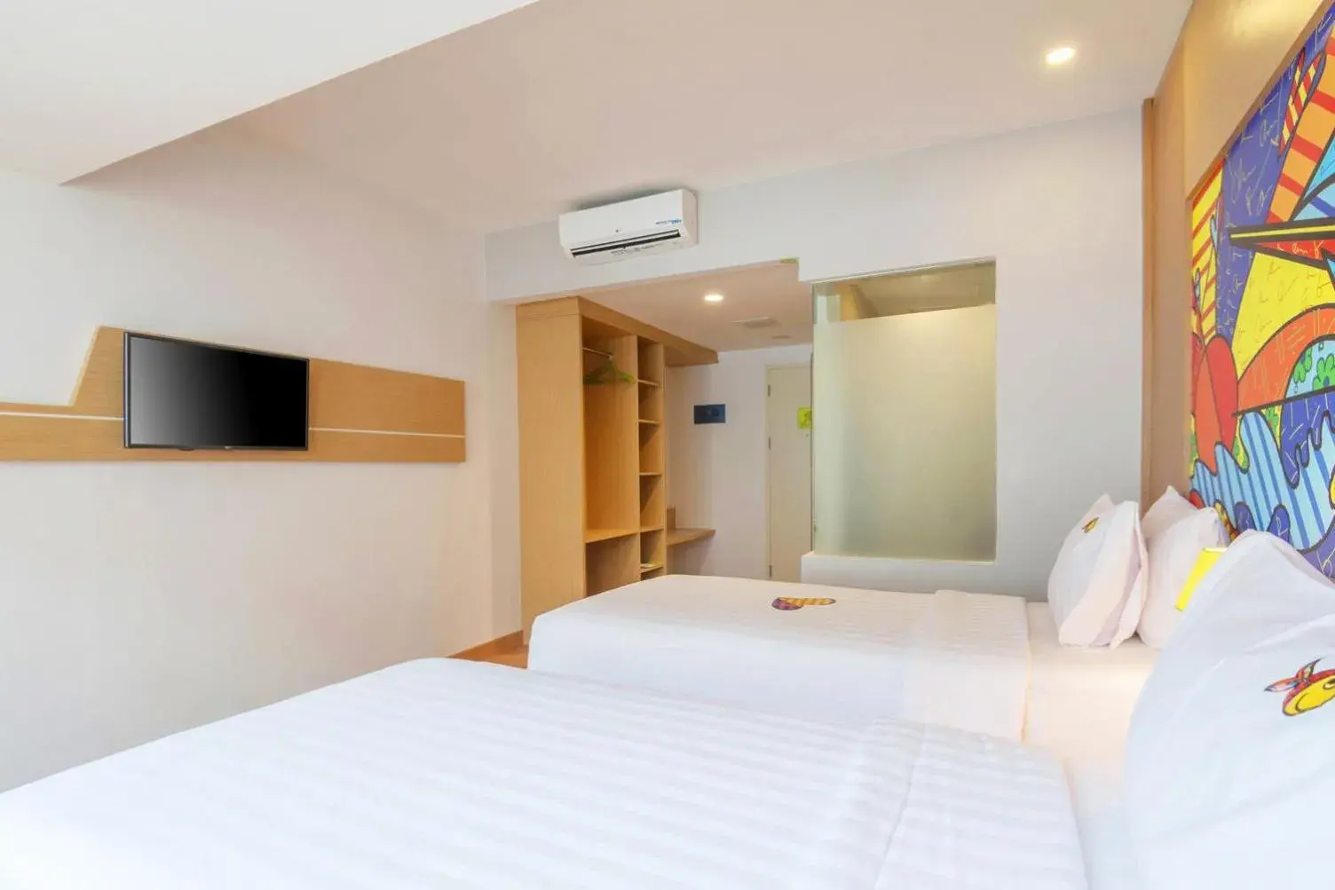 Bed in MaxOneHotels at Resort Makassar Bed in MaxOneHotels at Resort Makassar