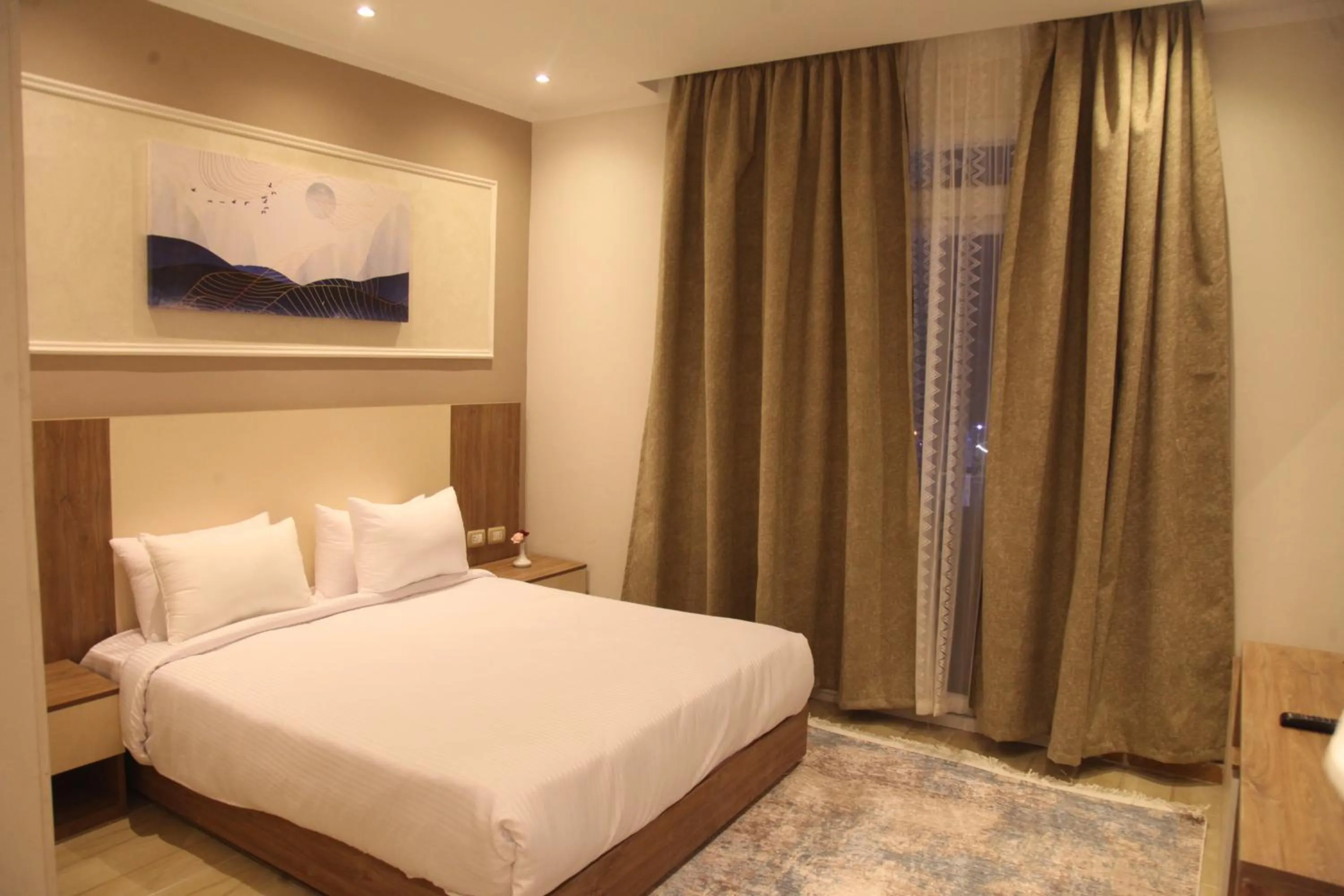 Bed in Jewel Assiut Hotel