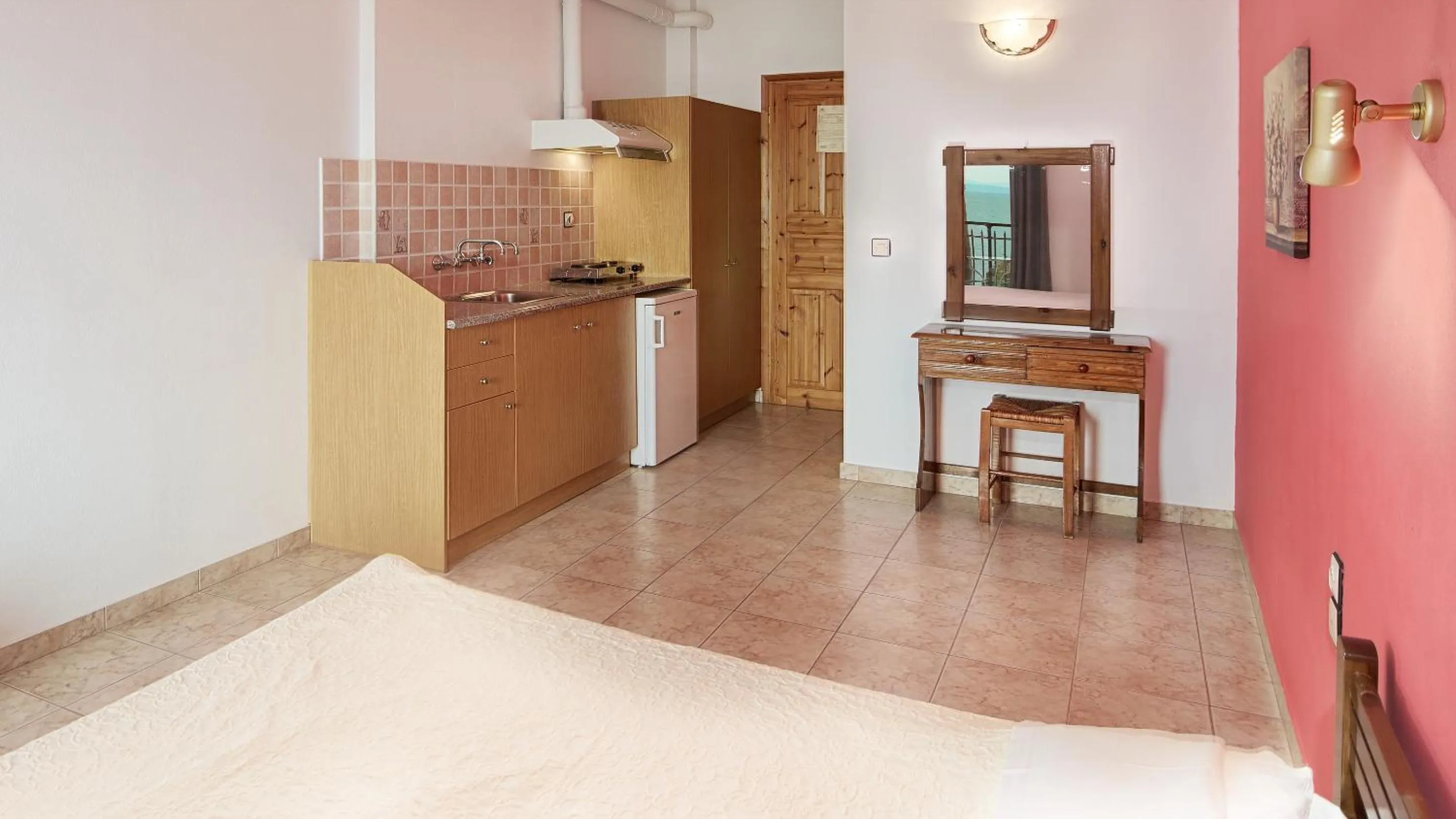 Kitchen or kitchenette, Bed in Pharos Rooms