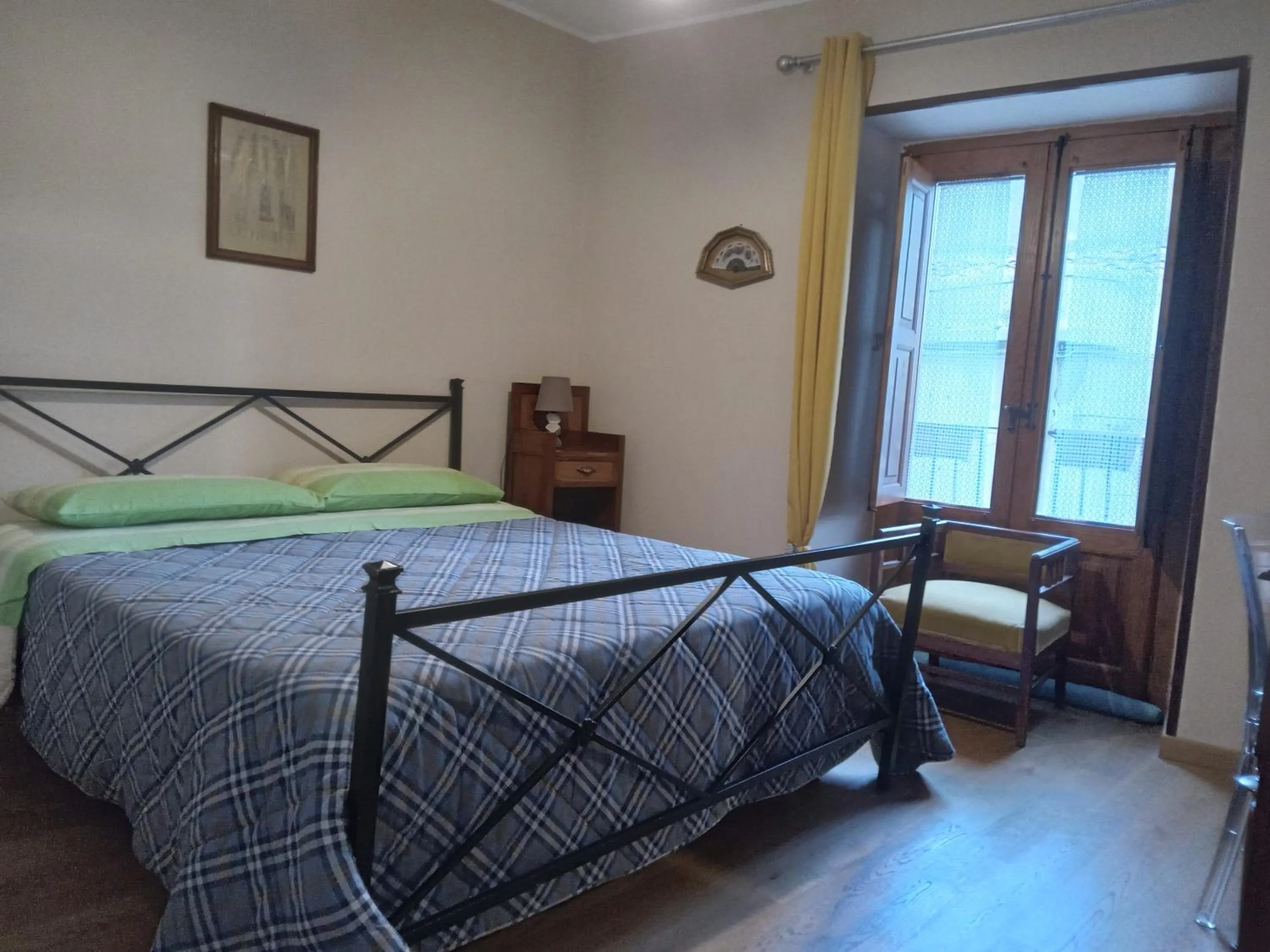 Bed in San Nicolò Holiday Home