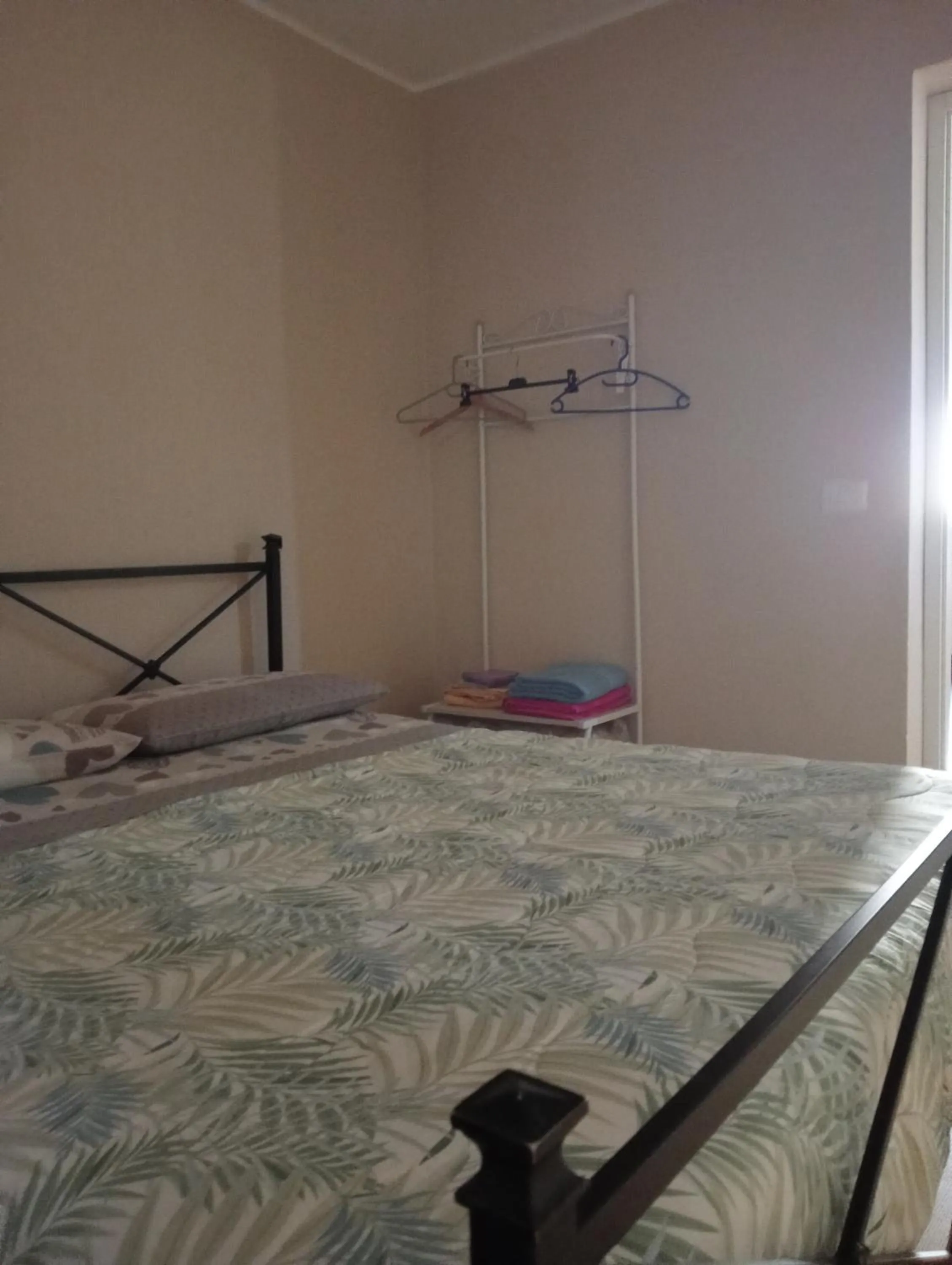 Bed in San Nicolò Holiday Home