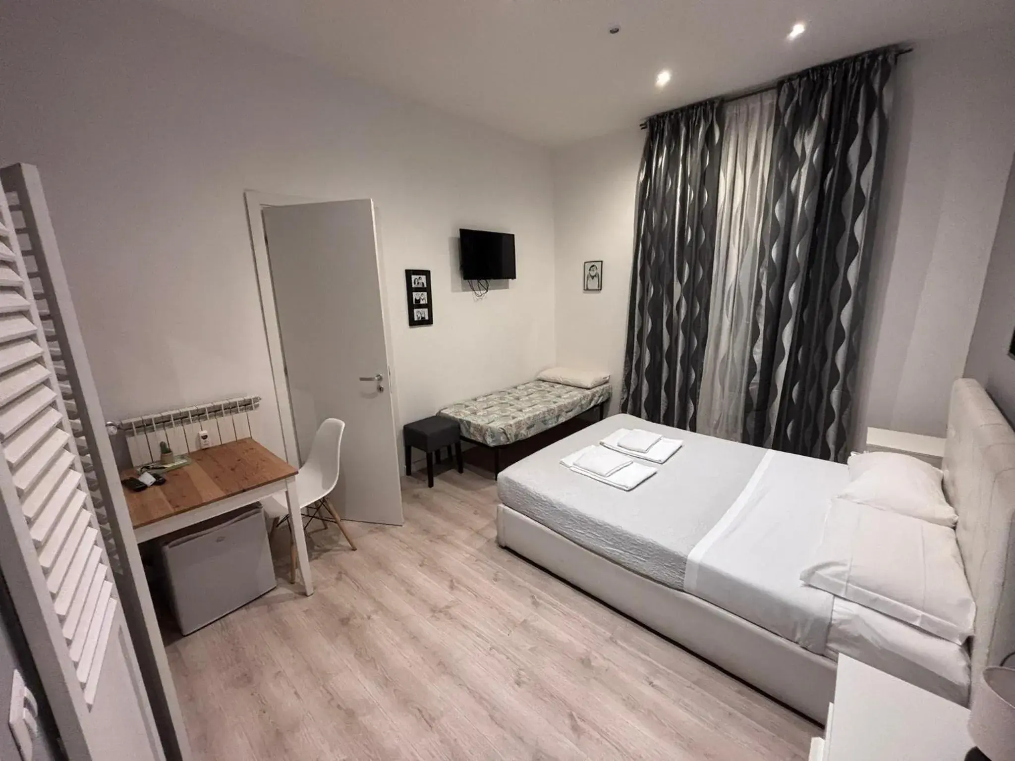 Deluxe Room (2 Adults + 1 Child) - single occupancy in Spazio Cavour Guesthouse Deluxe Room (2 Adults + 1 Child) - single occupancy in Spazio Cavour Guesthouse