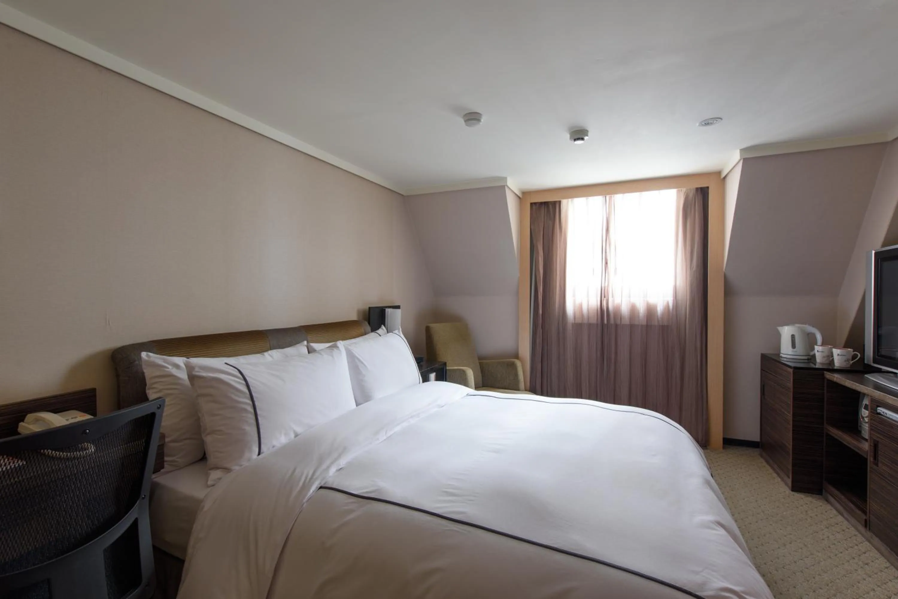 Bed in K Hotel Taipei