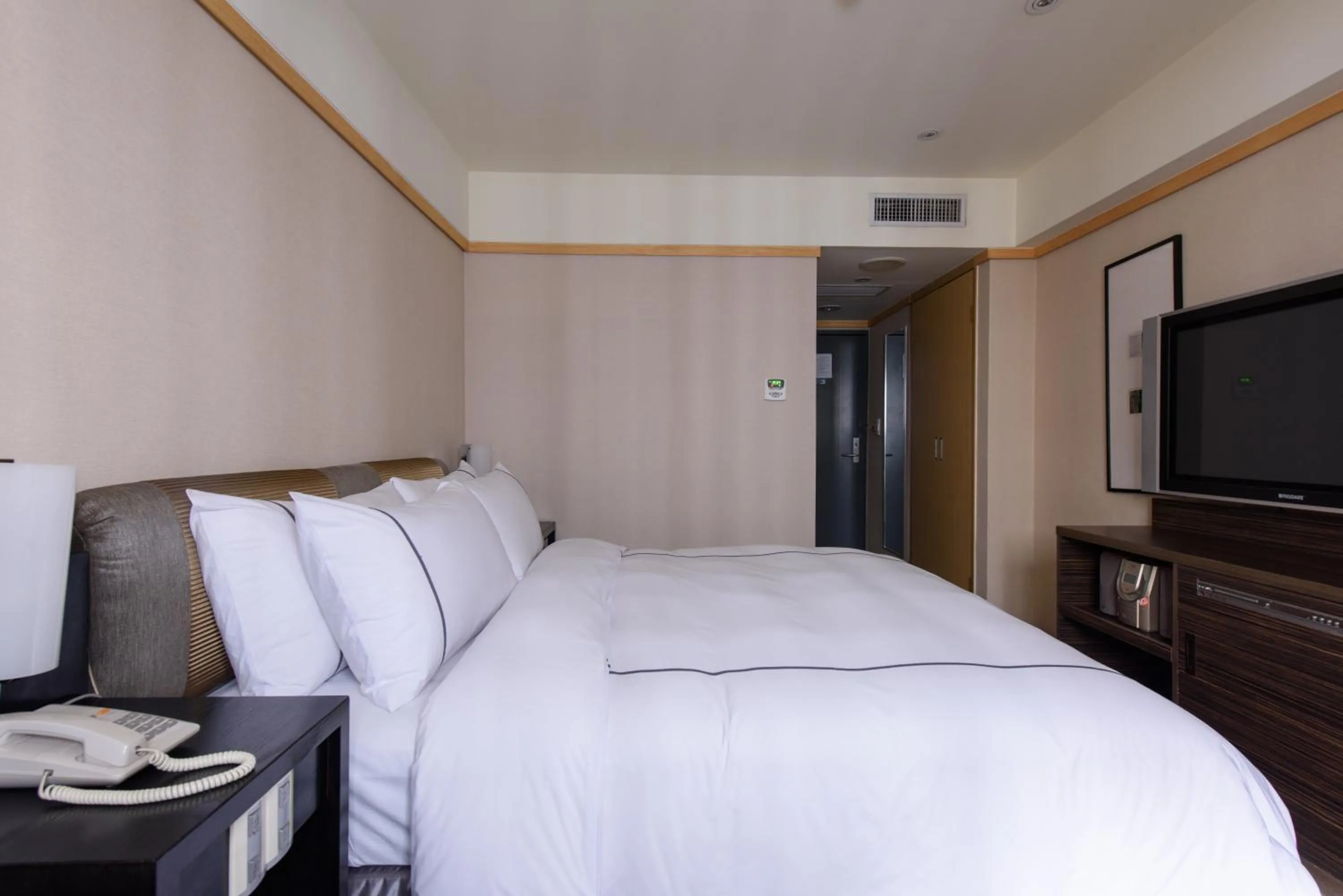 Bed in K Hotel Taipei