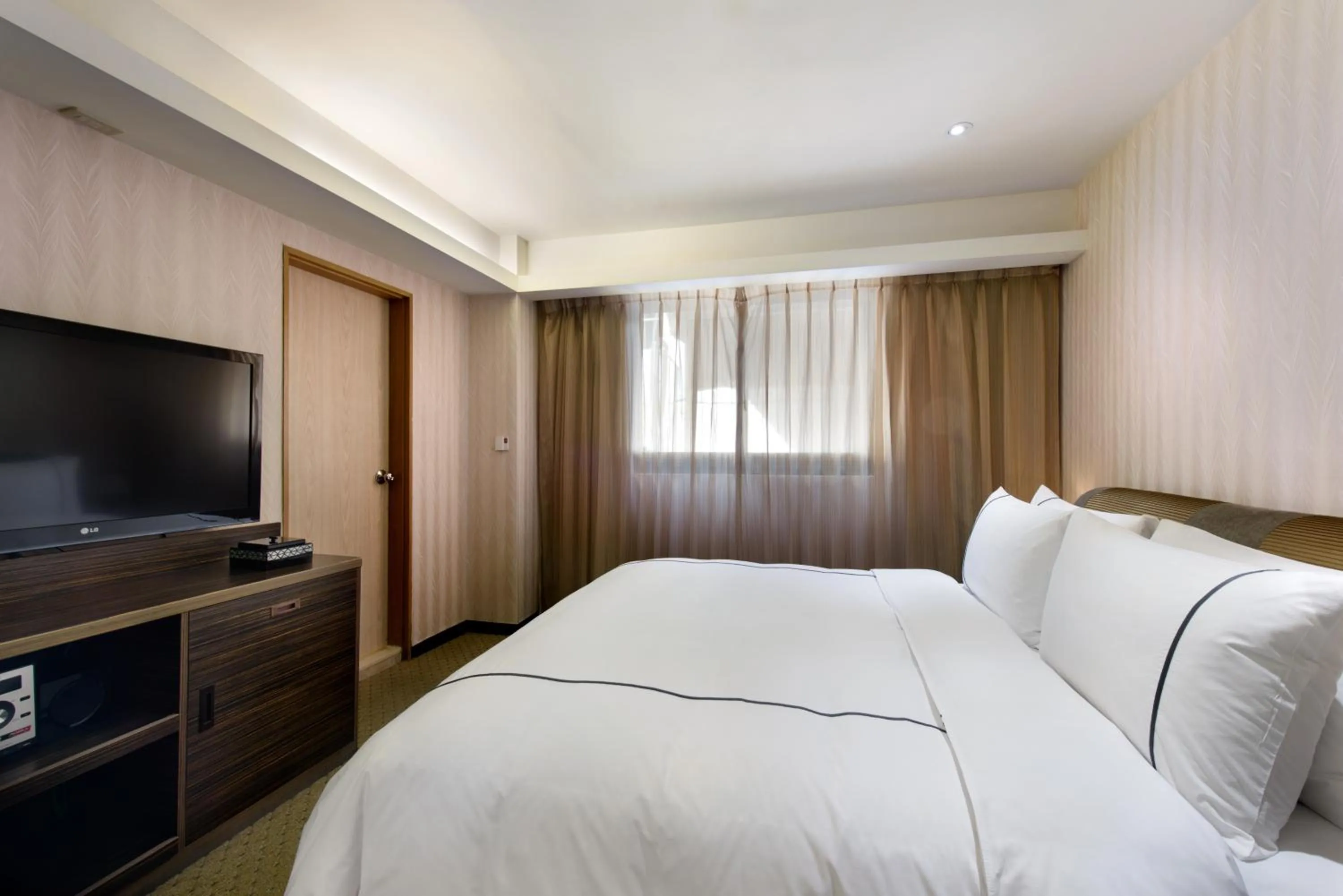 Bed in K Hotel Taipei