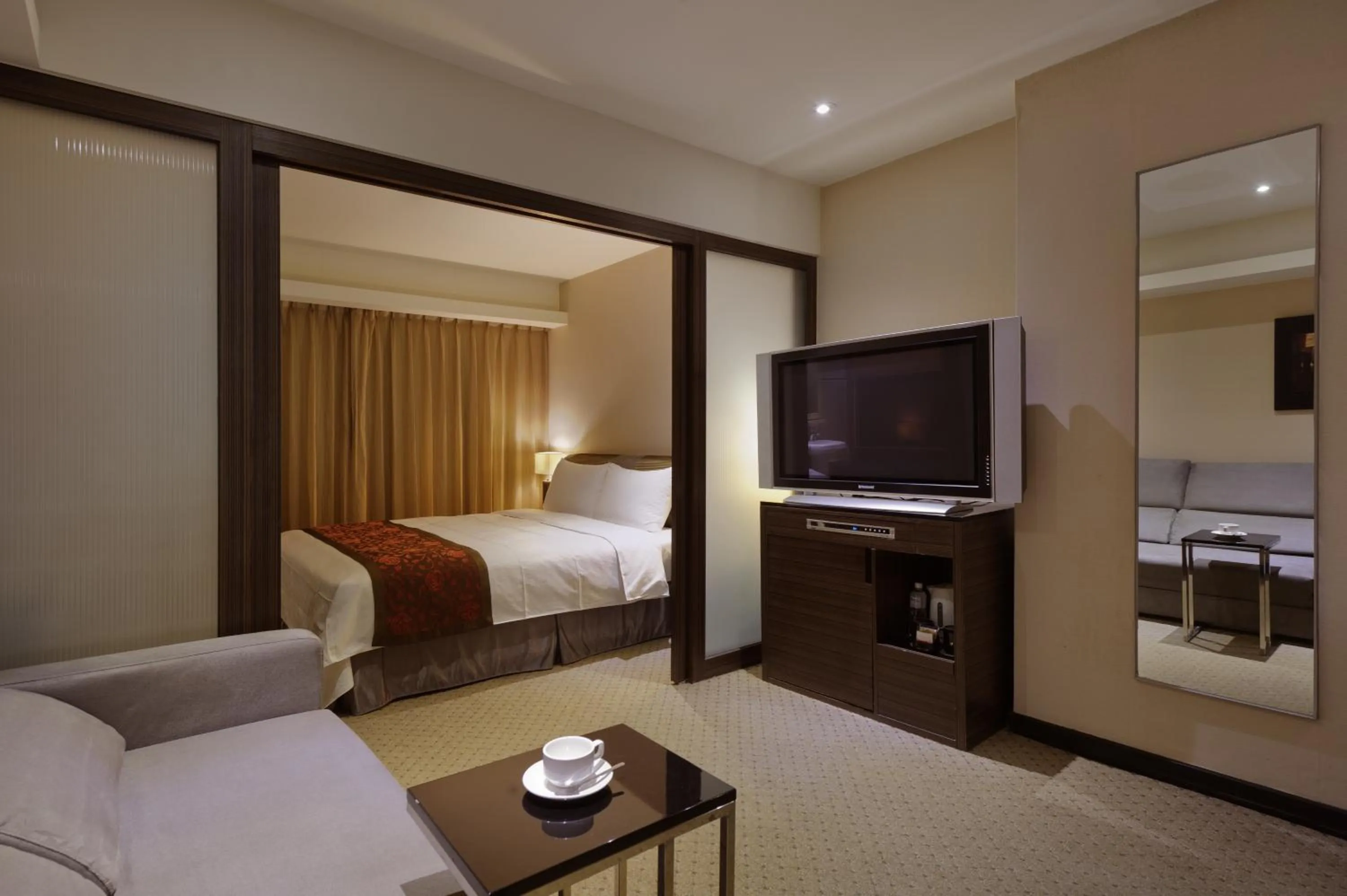 Living room, Bed in K Hotel Taipei