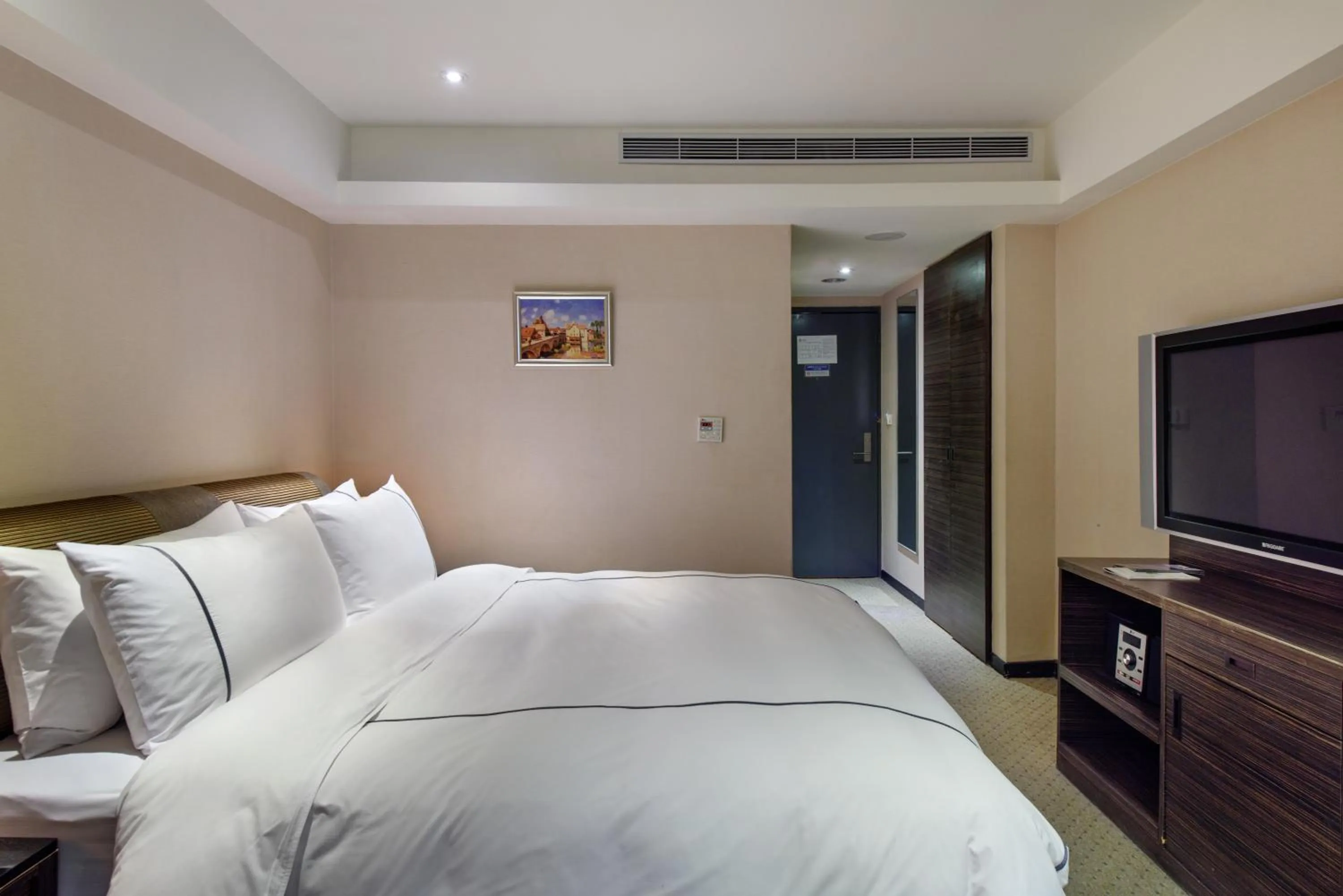 Bed in K Hotel Taipei