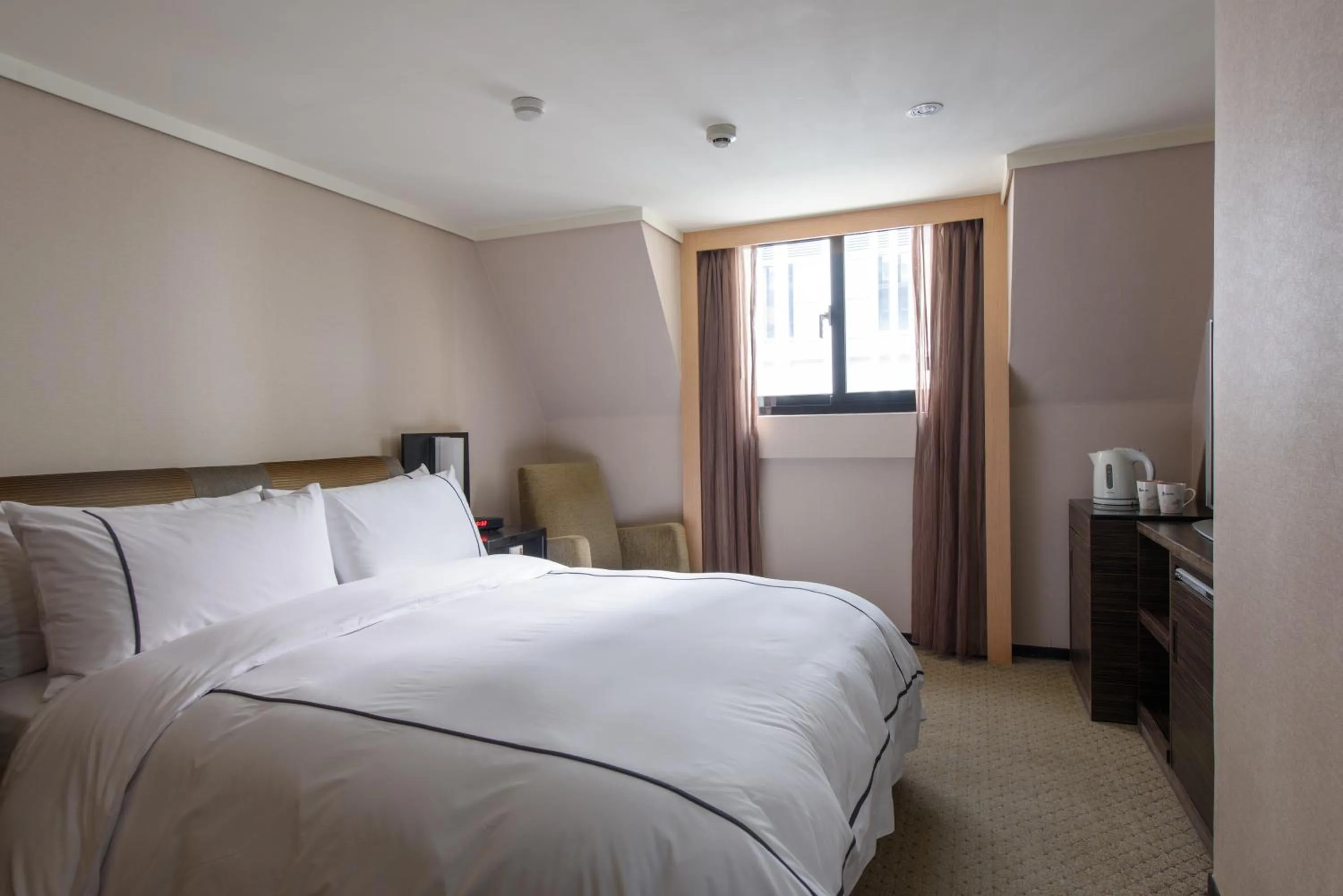 Bed in K Hotel Taipei