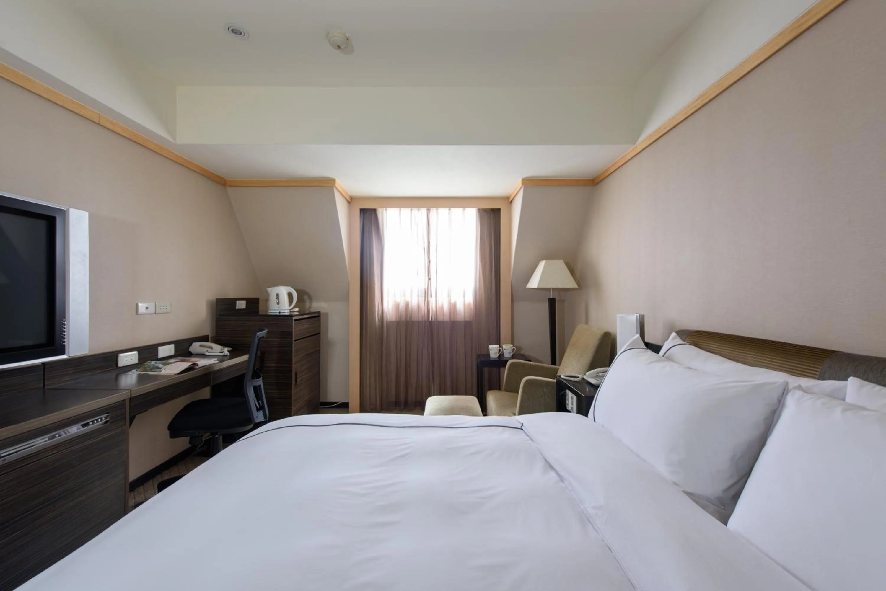 Bed in K Hotel Taipei