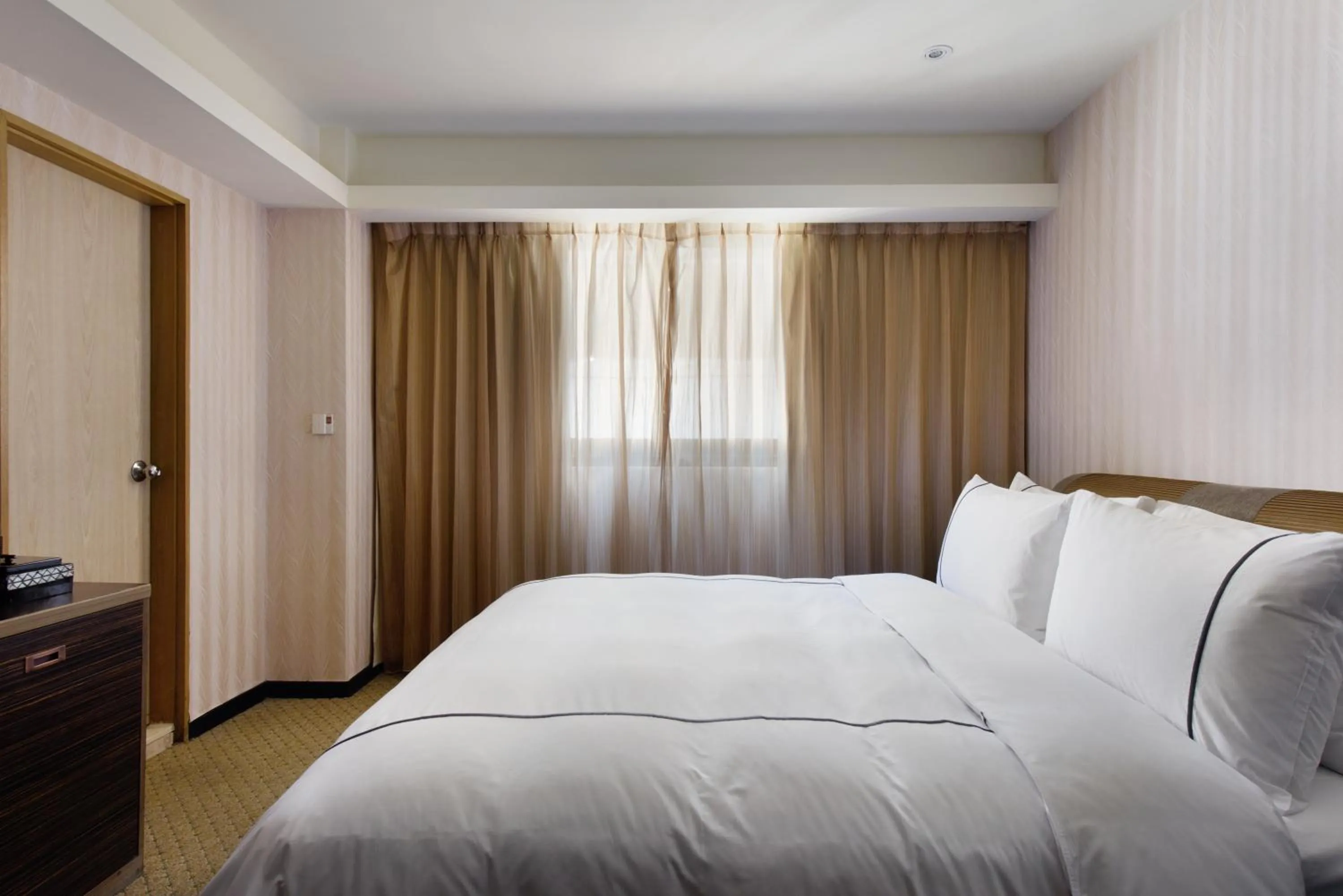 Bed in K Hotel Taipei