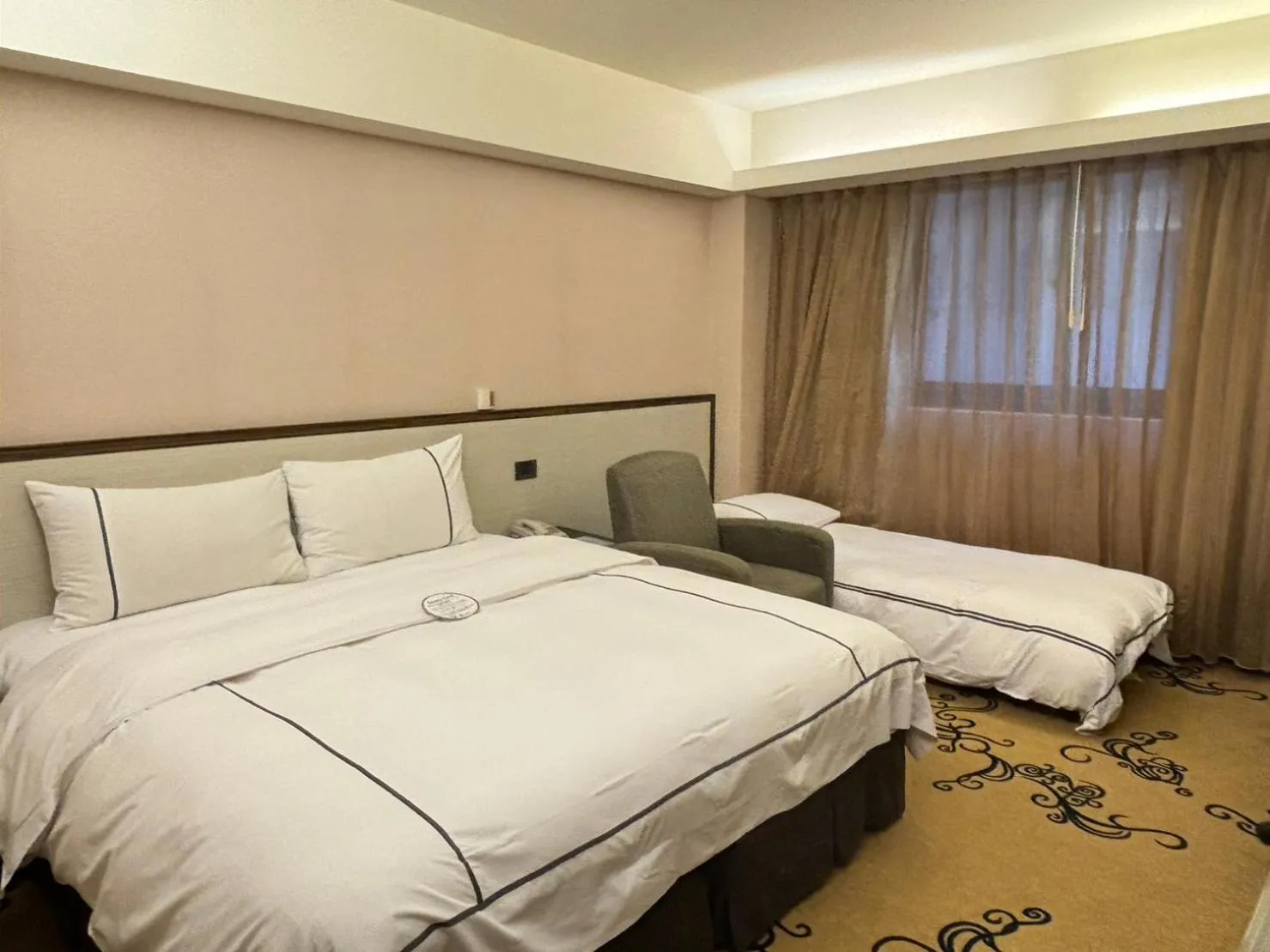 Bed in K Hotel Taipei