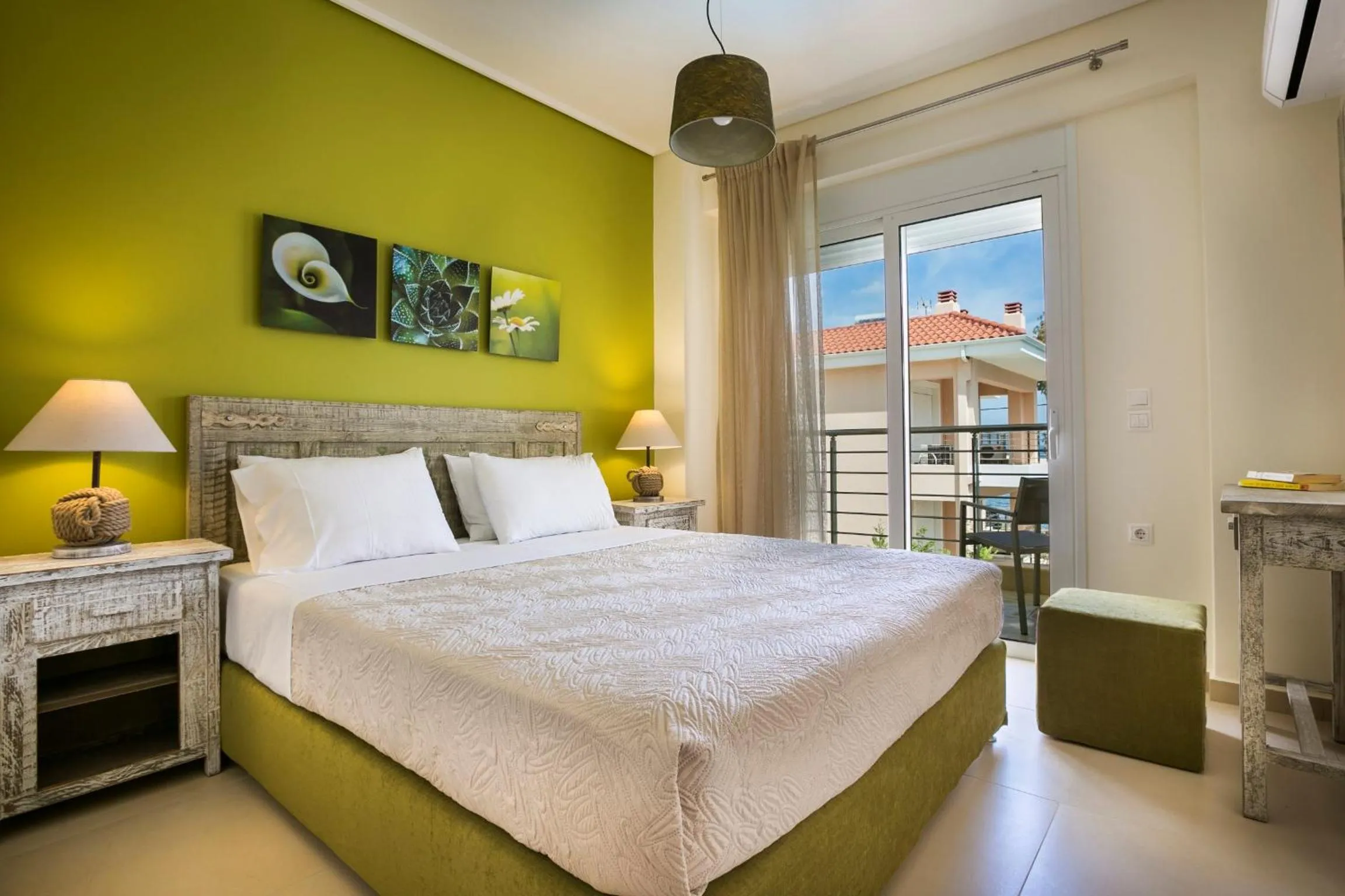 Bed in Meliti Waterfront Suites