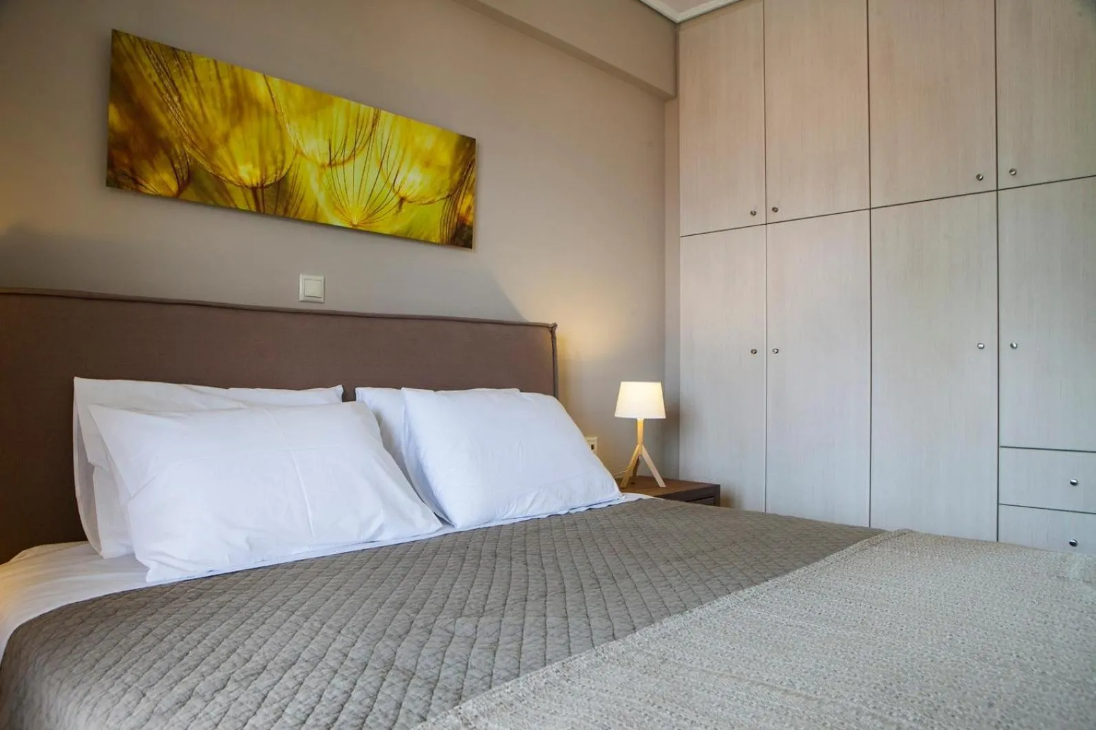 Bed in Meliti Waterfront Suites